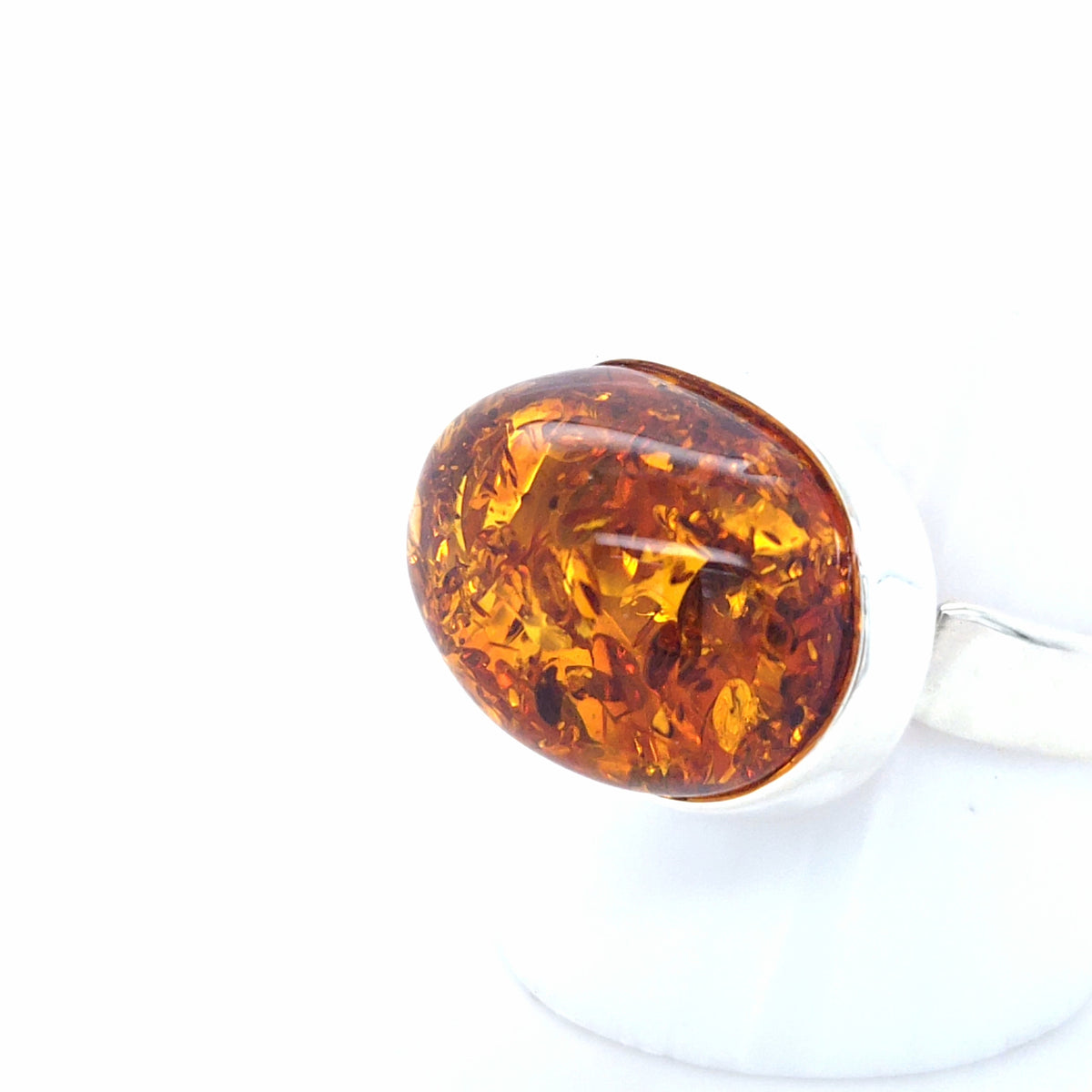 Klassisch-moderner Bernstein-Ring in Silber – Flexibles Design mit leuchtendem Naturstein