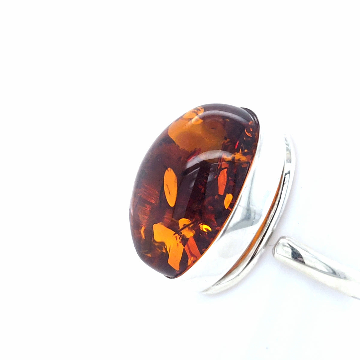 Ausdrucksstarker Bernstein-Ring in Silber – Markanter Naturstein mit flexibler Ringschiene