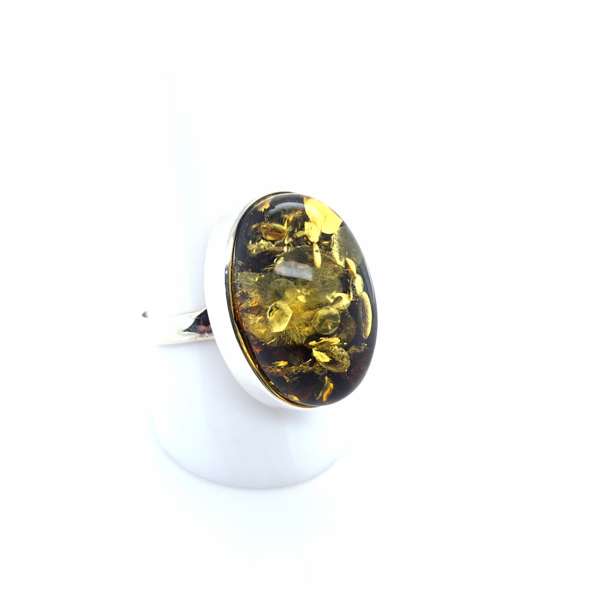 Grüner Bernsteinring mit Glitzer-Einschlüssen, 925er Silber – oval, verstellbar