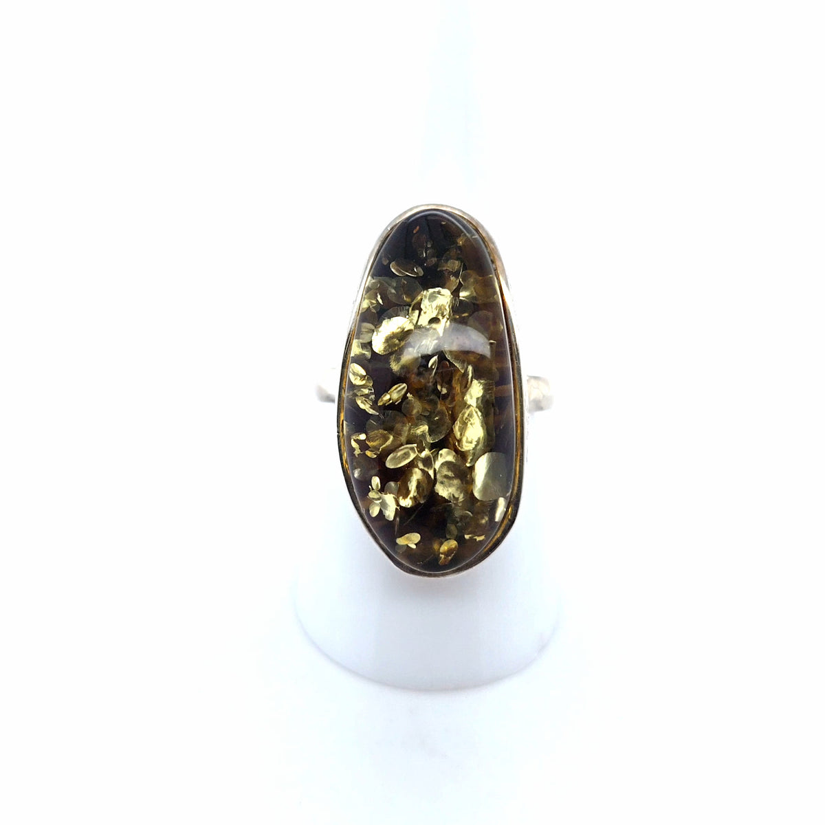 Funkelnder Ring mit grünem Ostsee-Bernstein oval, 925er Silber – verstellbar