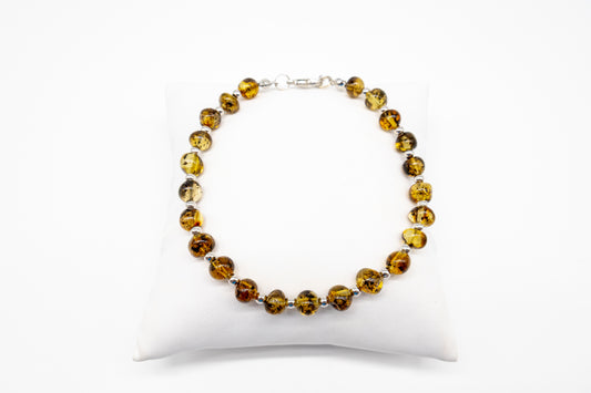 Elegant bracelet made of genuine amber and 925 silver