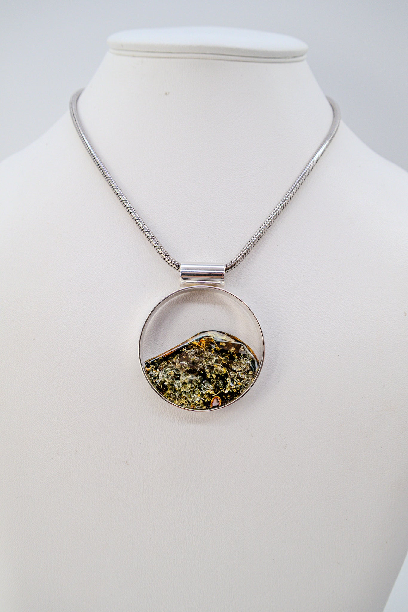 Unique jewelry – round amber pendant silver