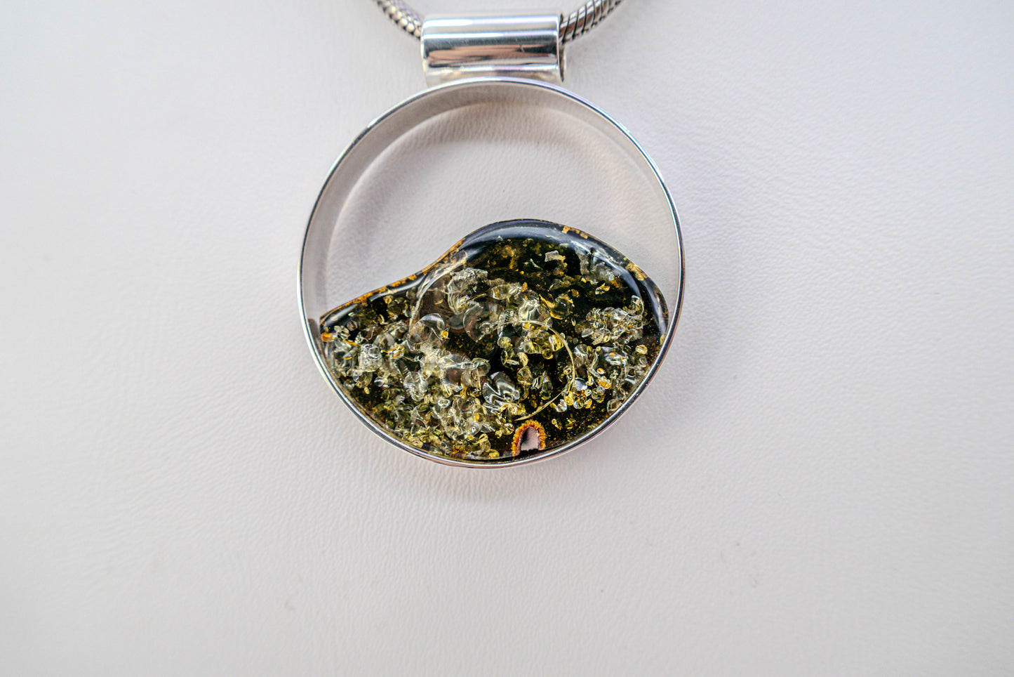 Unique jewelry – round amber pendant silver