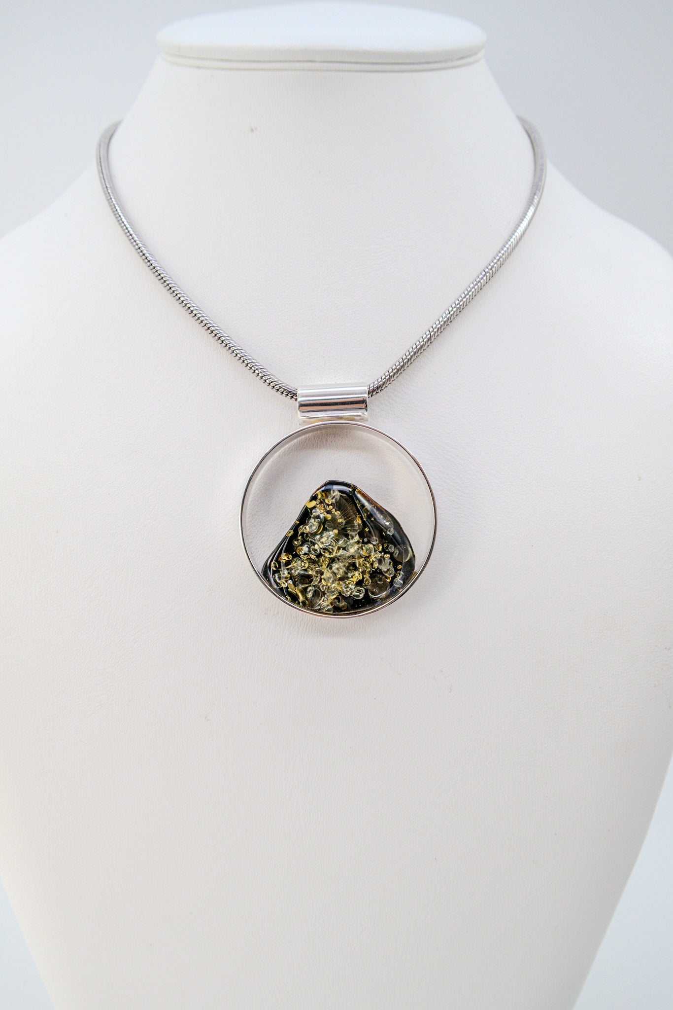 Unique jewelry – round amber pendant silver