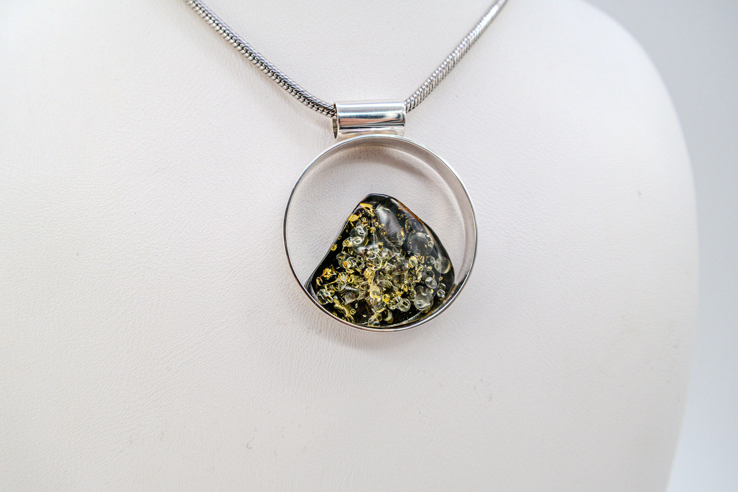 Unique jewelry – round amber pendant silver