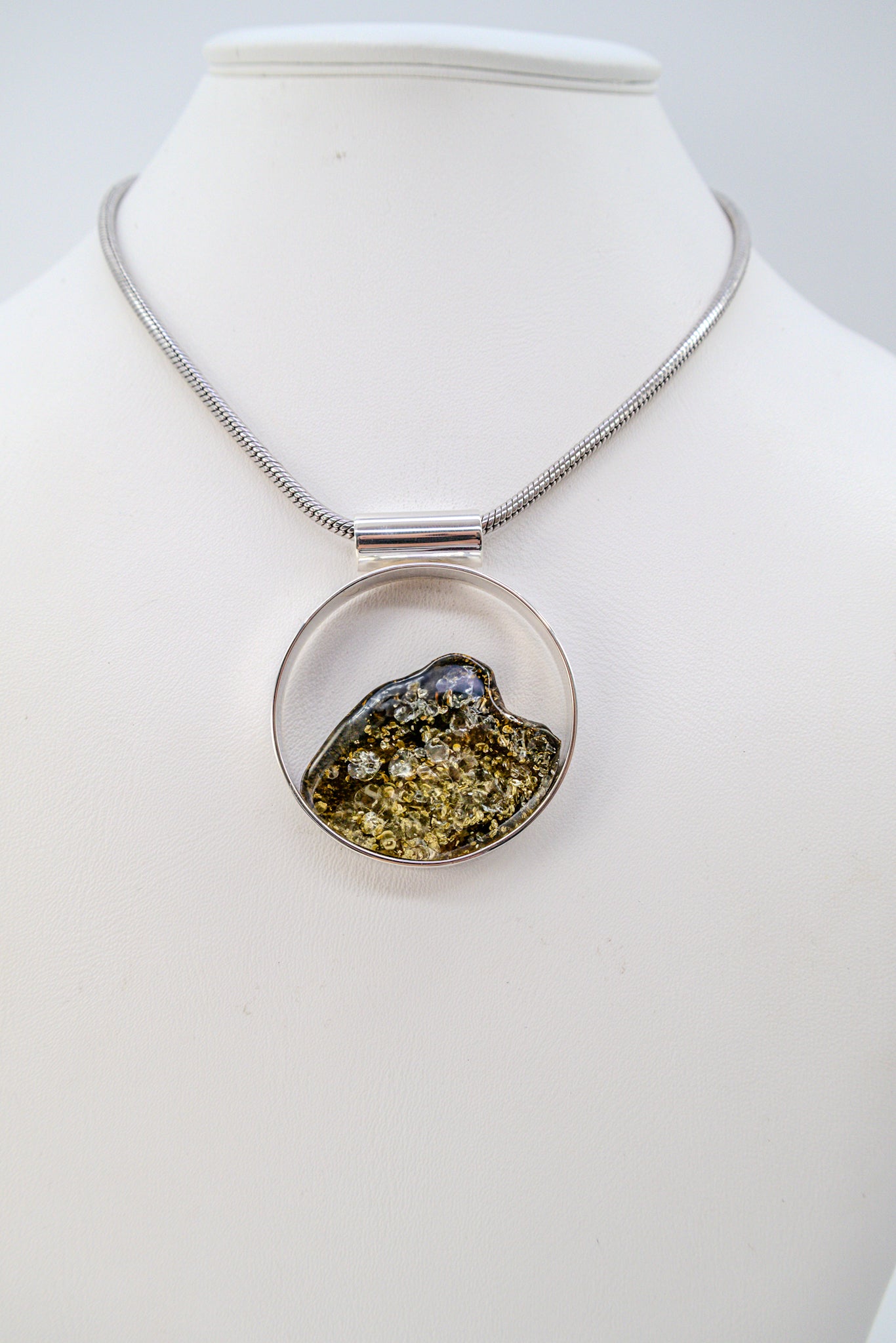 Unique jewelry – round amber pendant silver