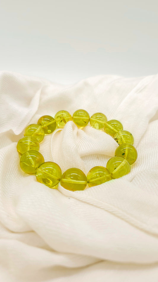 Edles Bernstein Armband mit grünen XL-Kugeln
