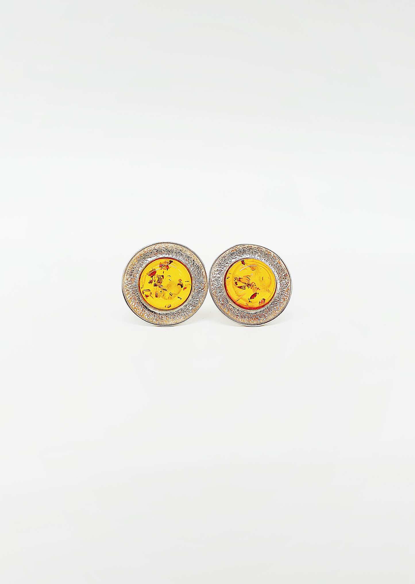 Round amber ear clips made of 925 sterling silver