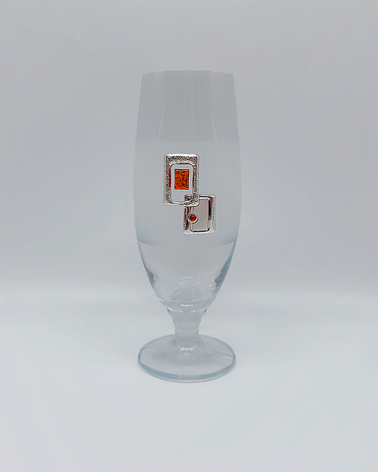 Elegantes Glas mit Bernstein und Silberdekoration