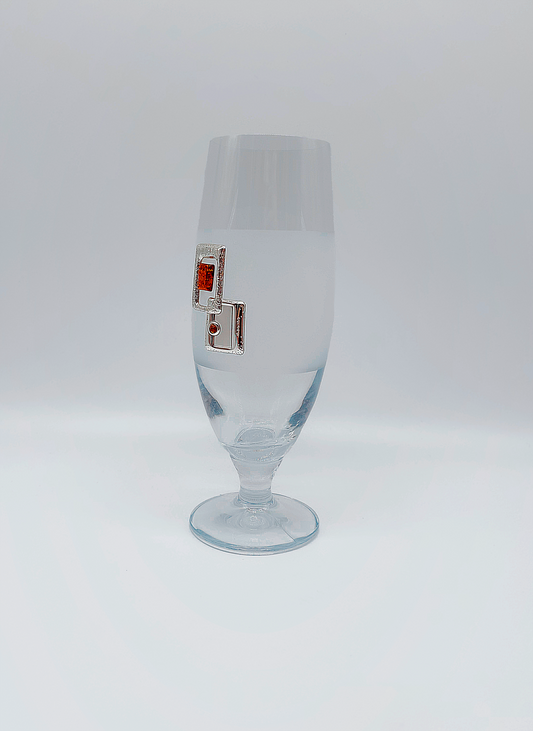 Elegantes Glas mit Bernstein und Silberdekoration