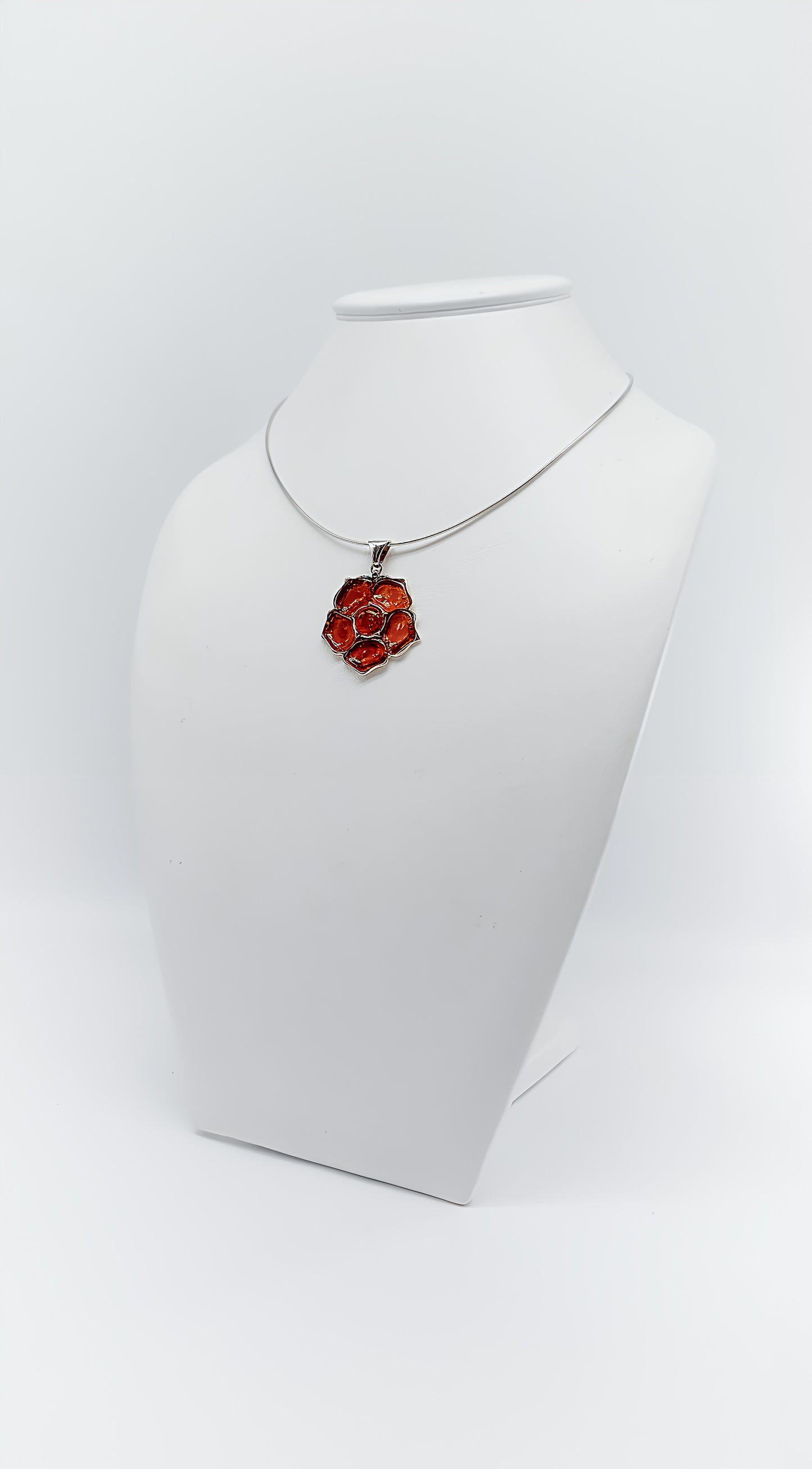 Fiery Blossom: Unique Amber Pendant