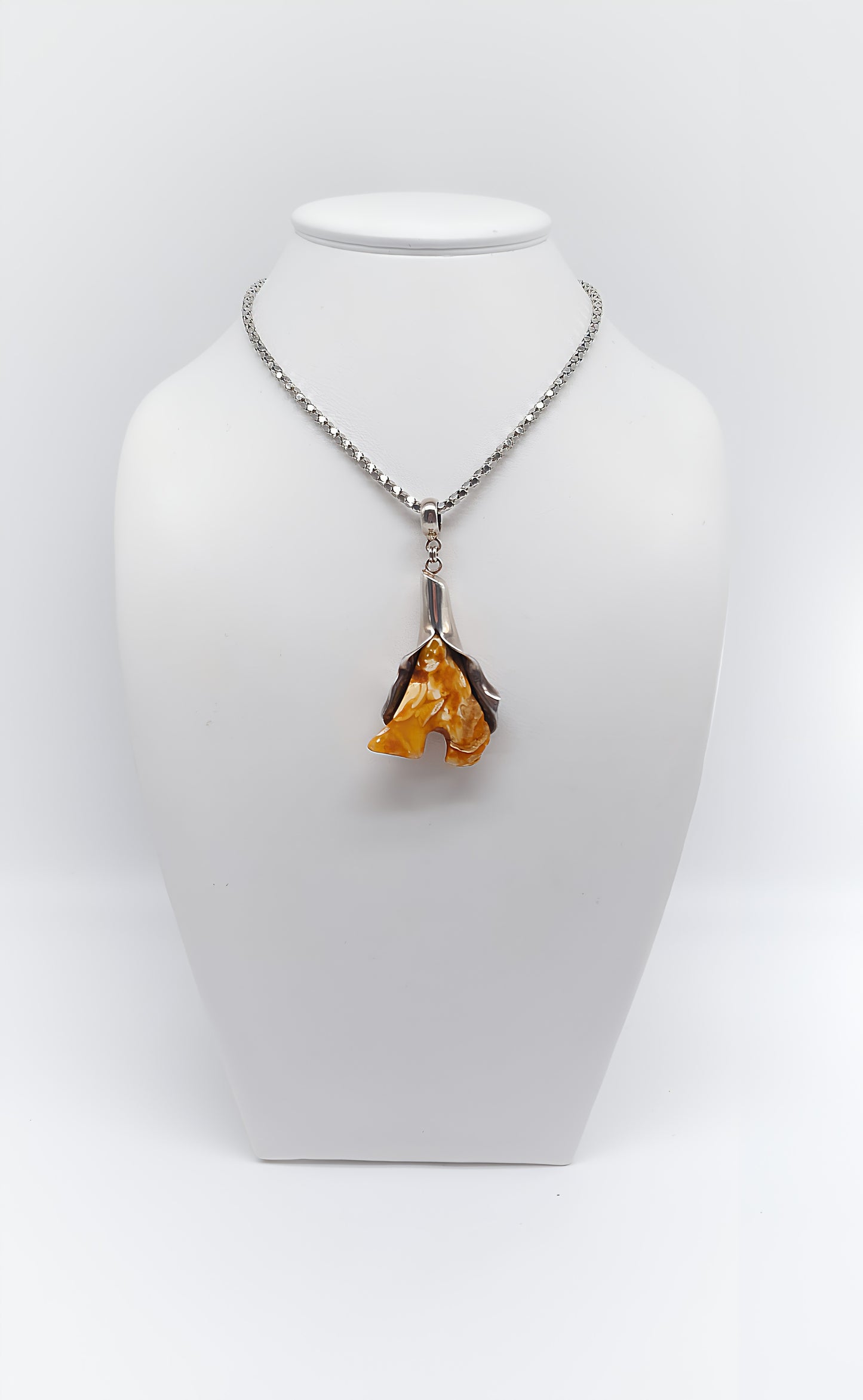 Whispering nature: unique amber pendant
