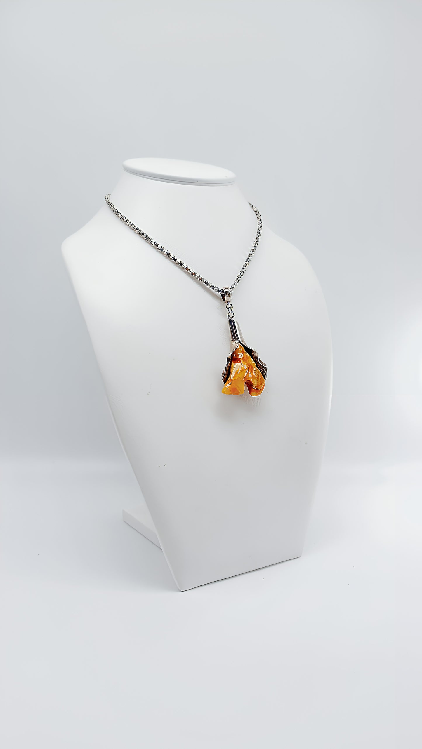 Whispering nature: unique amber pendant