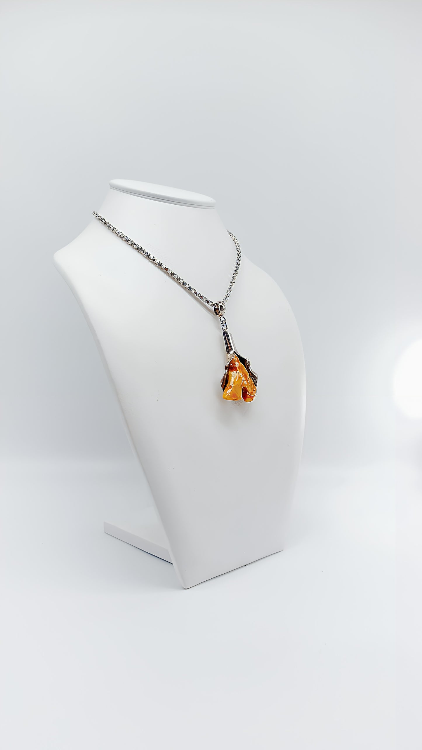 Whispering nature: unique amber pendant