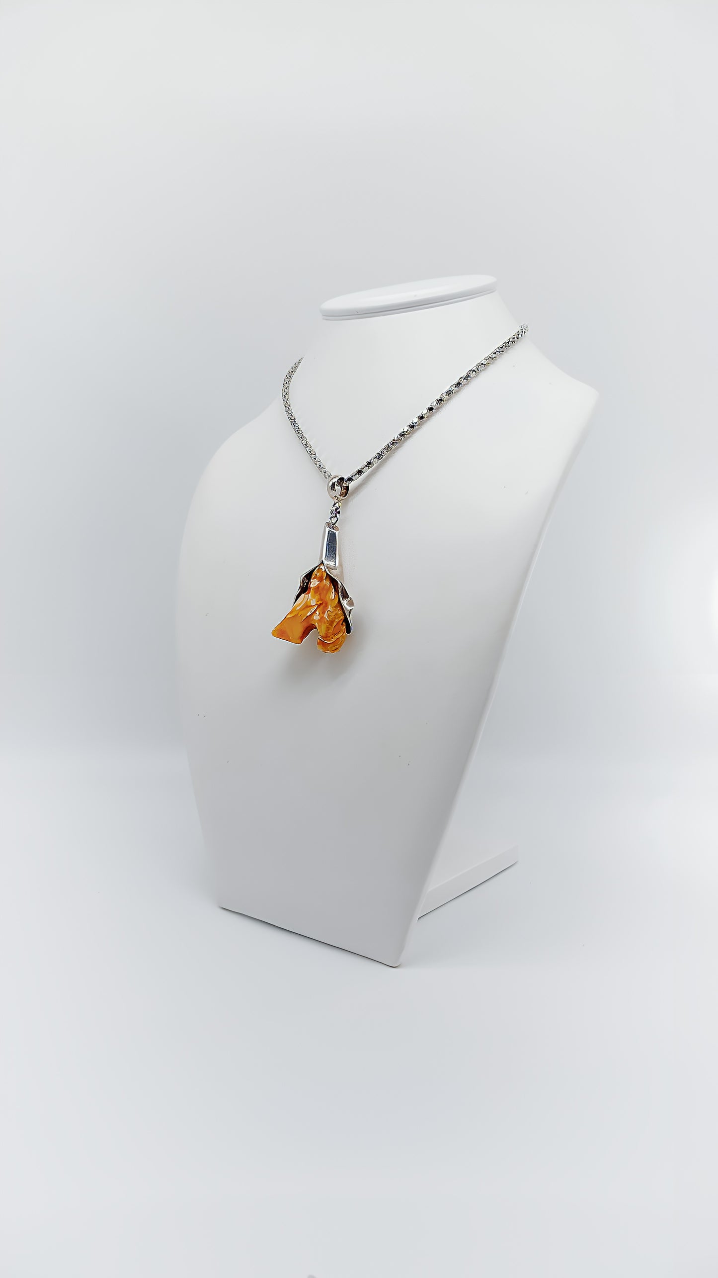 Whispering nature: unique amber pendant