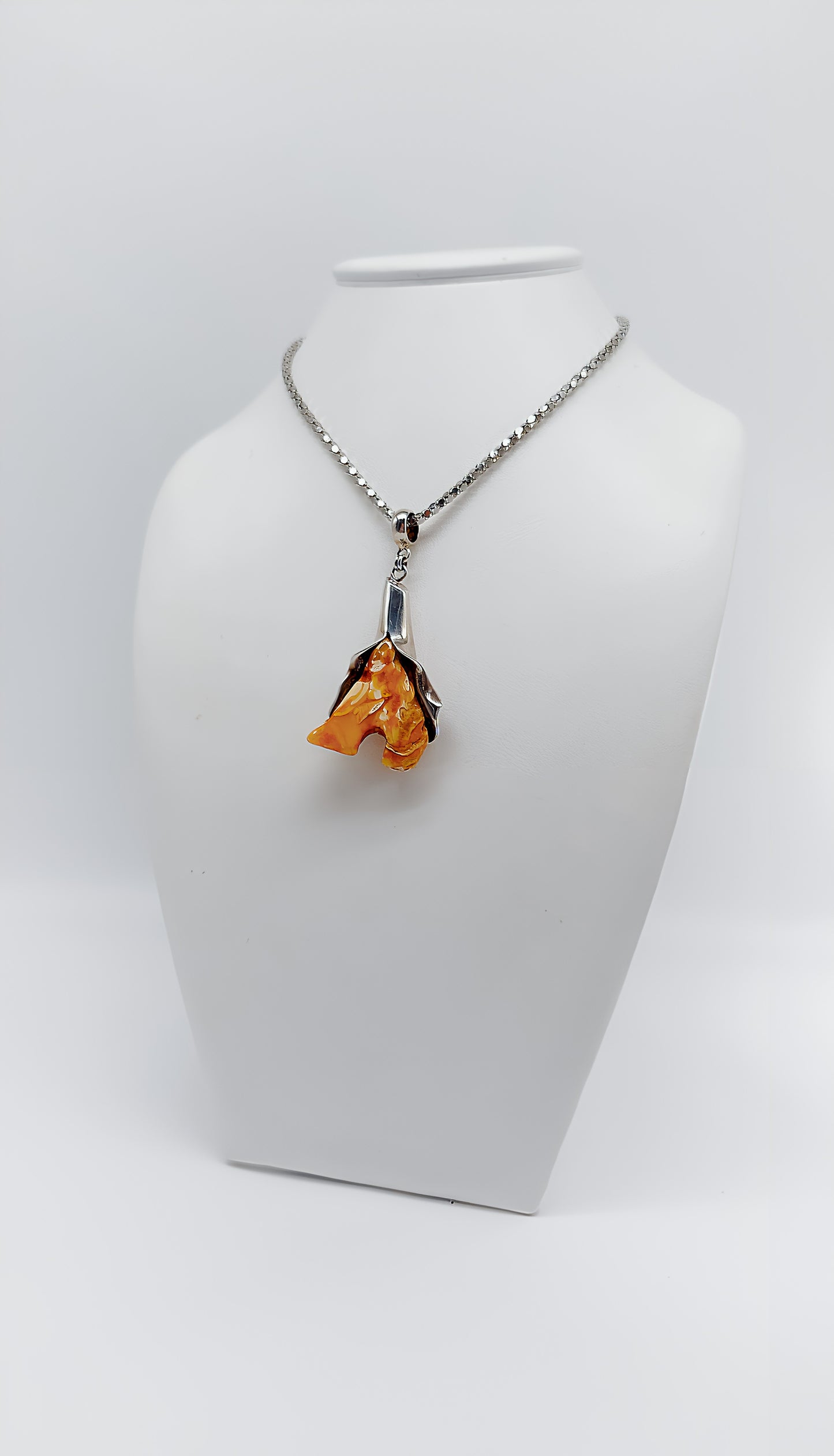 Whispering nature: unique amber pendant