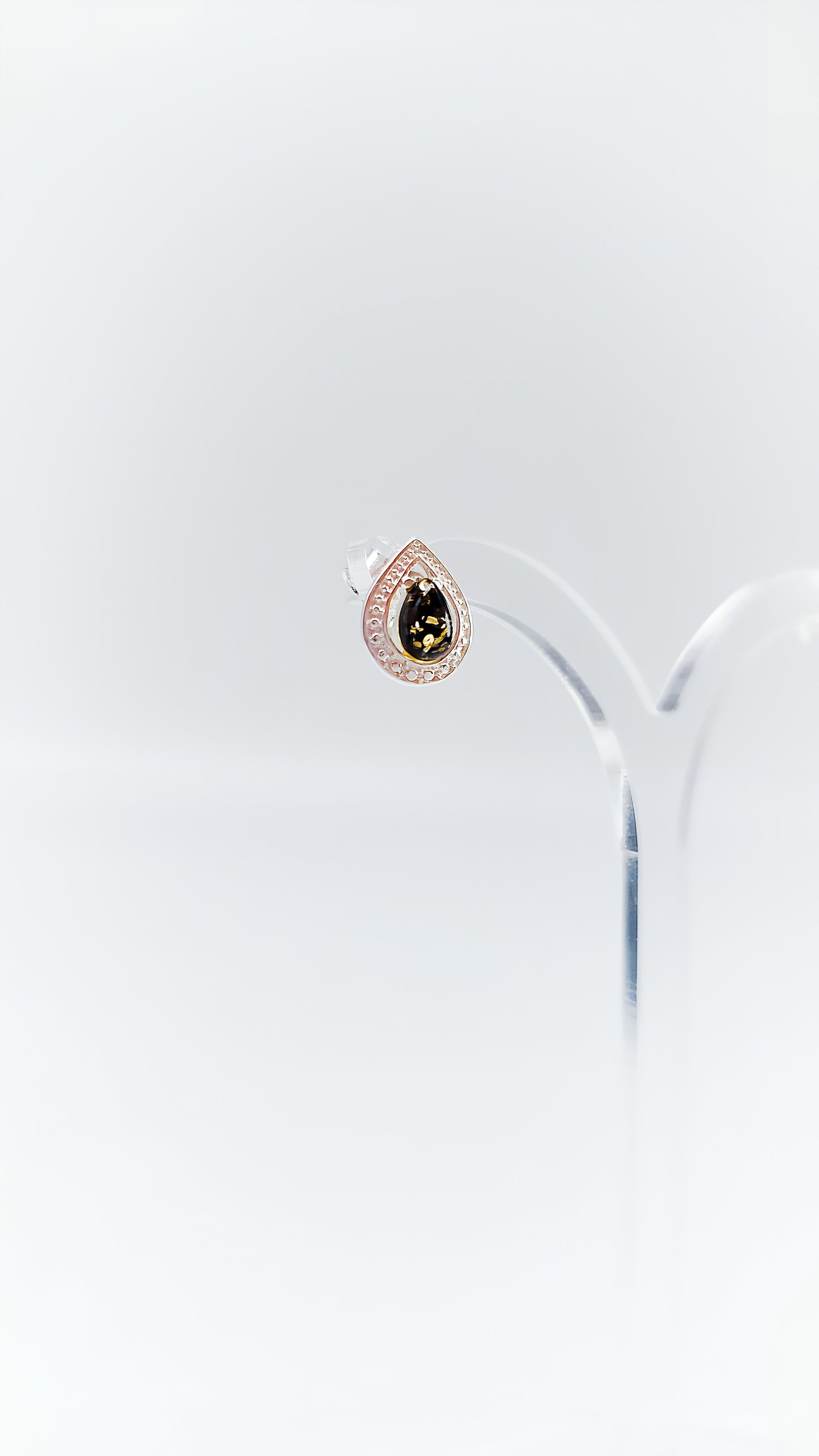 Luxurious drops: Black amber in silver