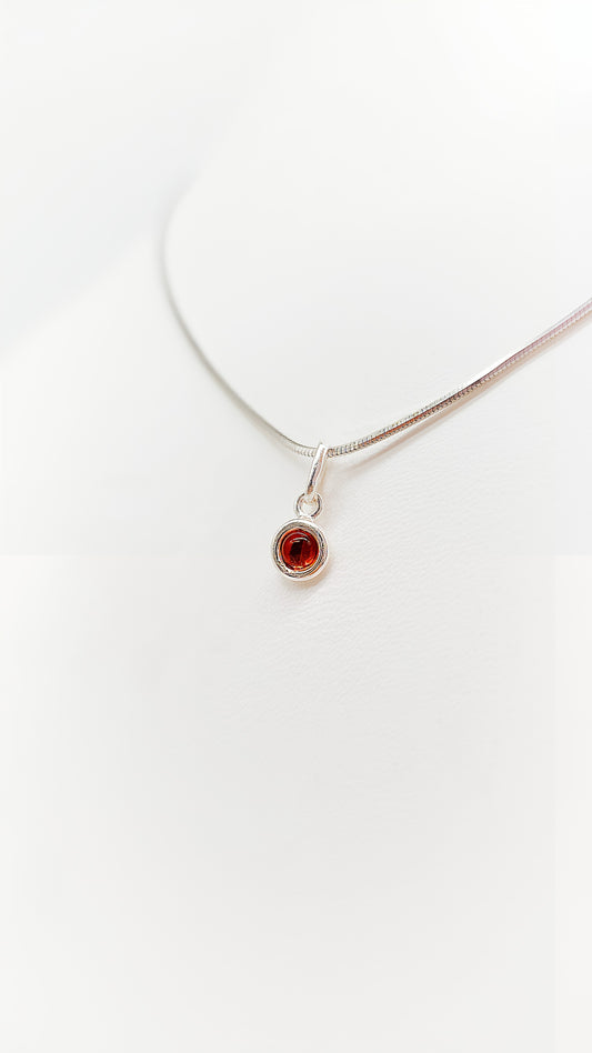 A touch of sparkle: Small amber pendant