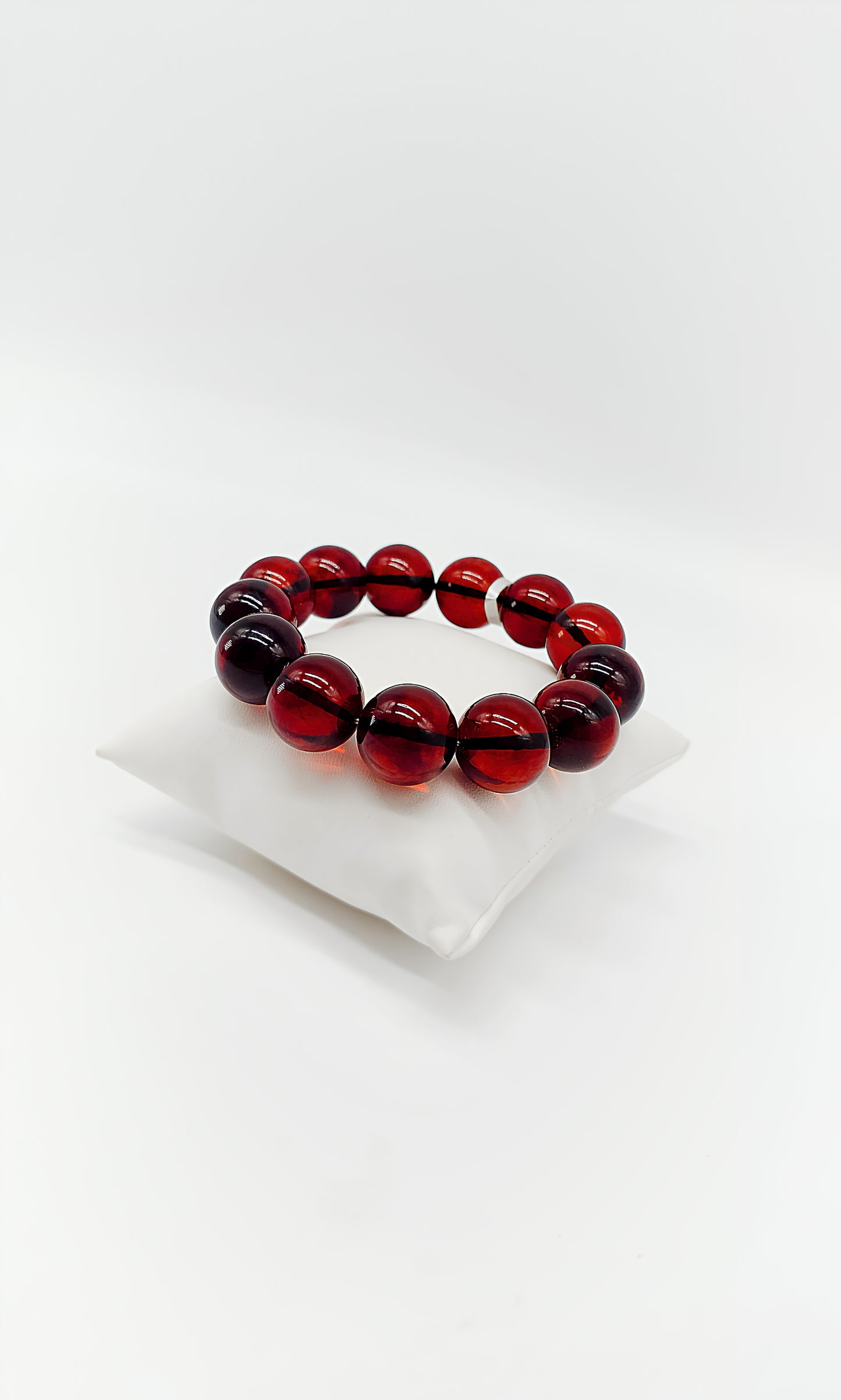 Amber bracelet: radiant shine in red