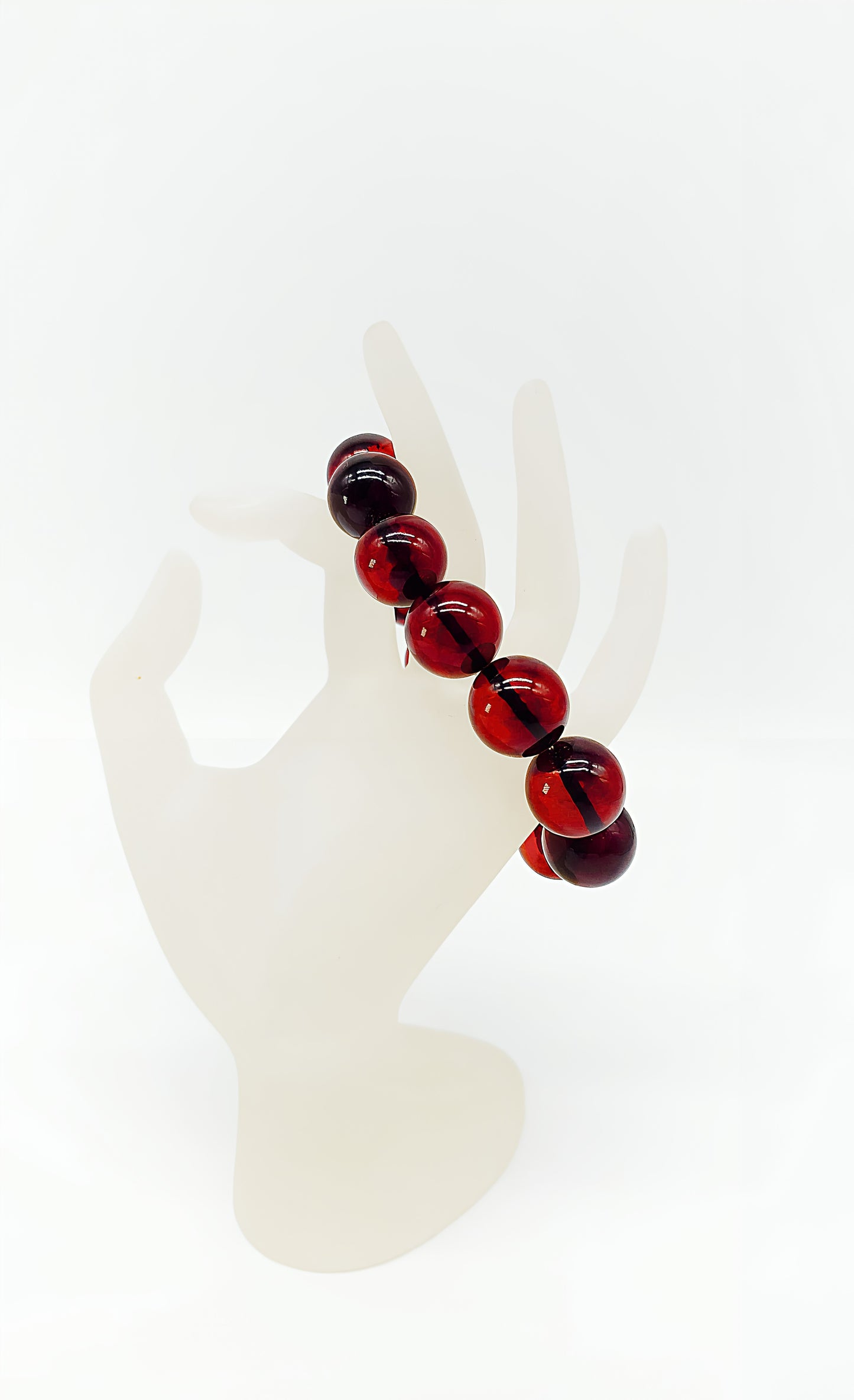 Amber bracelet: radiant shine in red