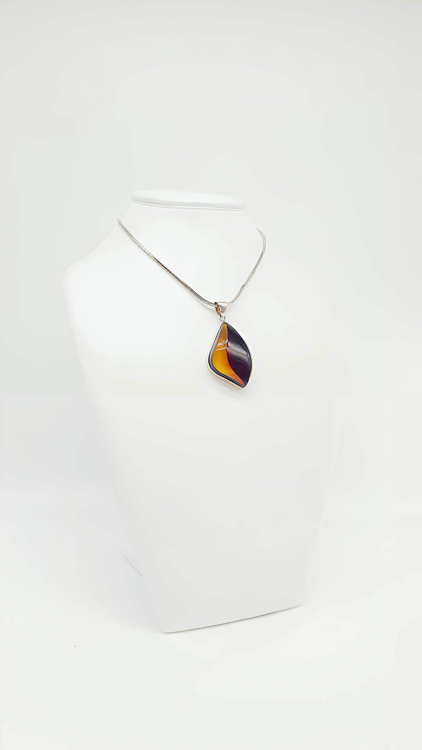 Unique shine: unique amber pendant
