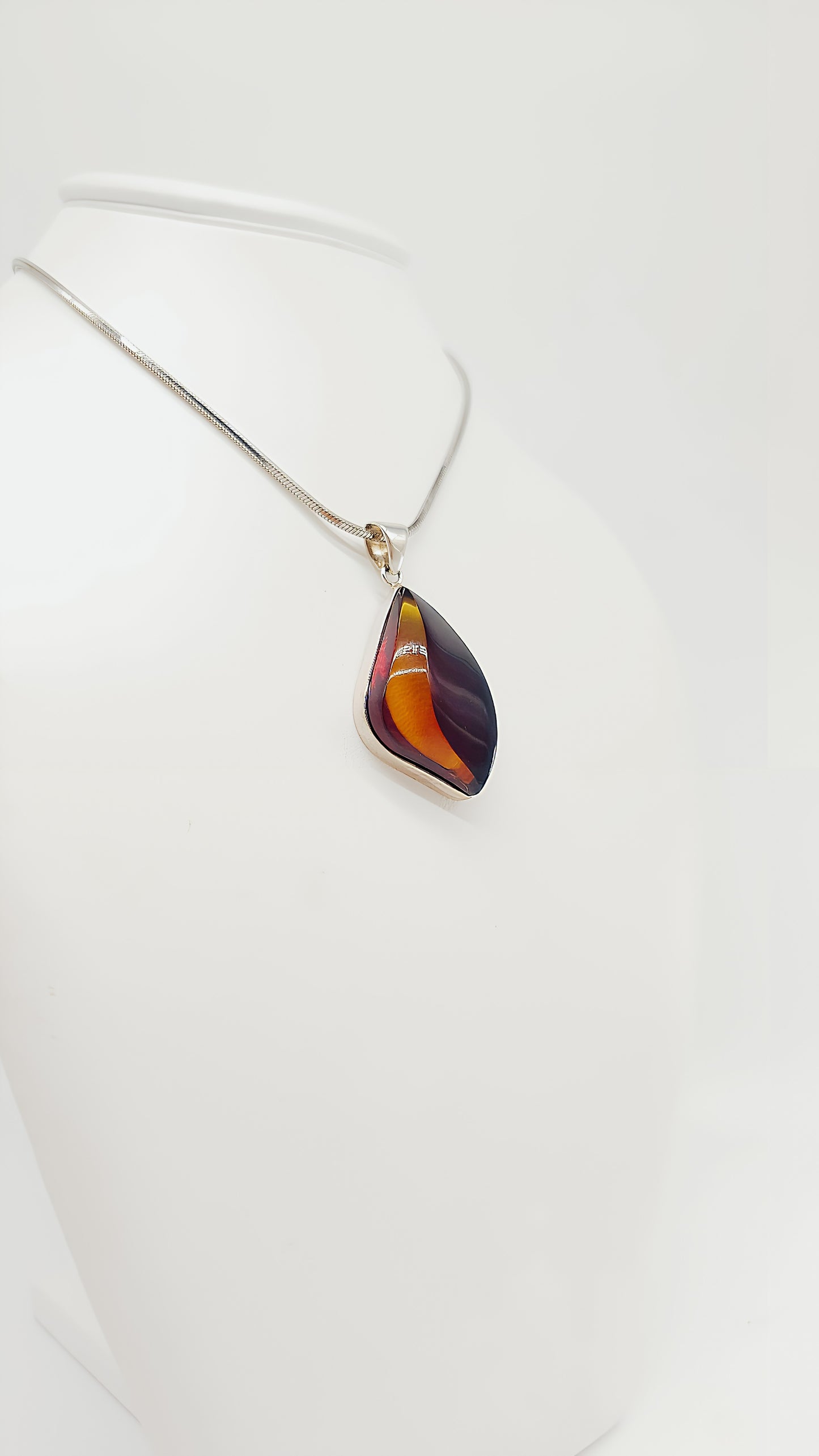 Unique shine: unique amber pendant