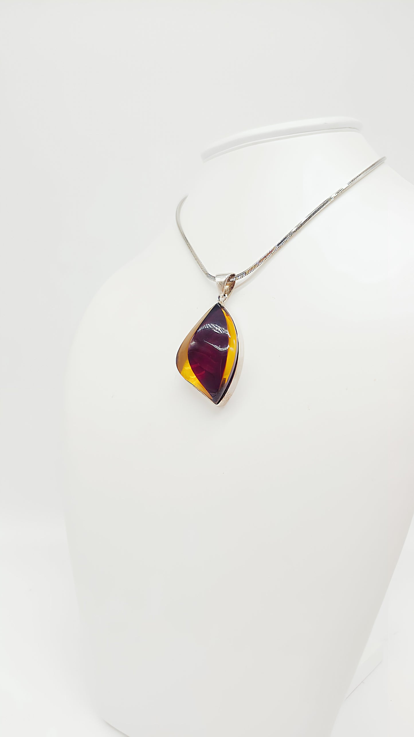 Unique shine: unique amber pendant