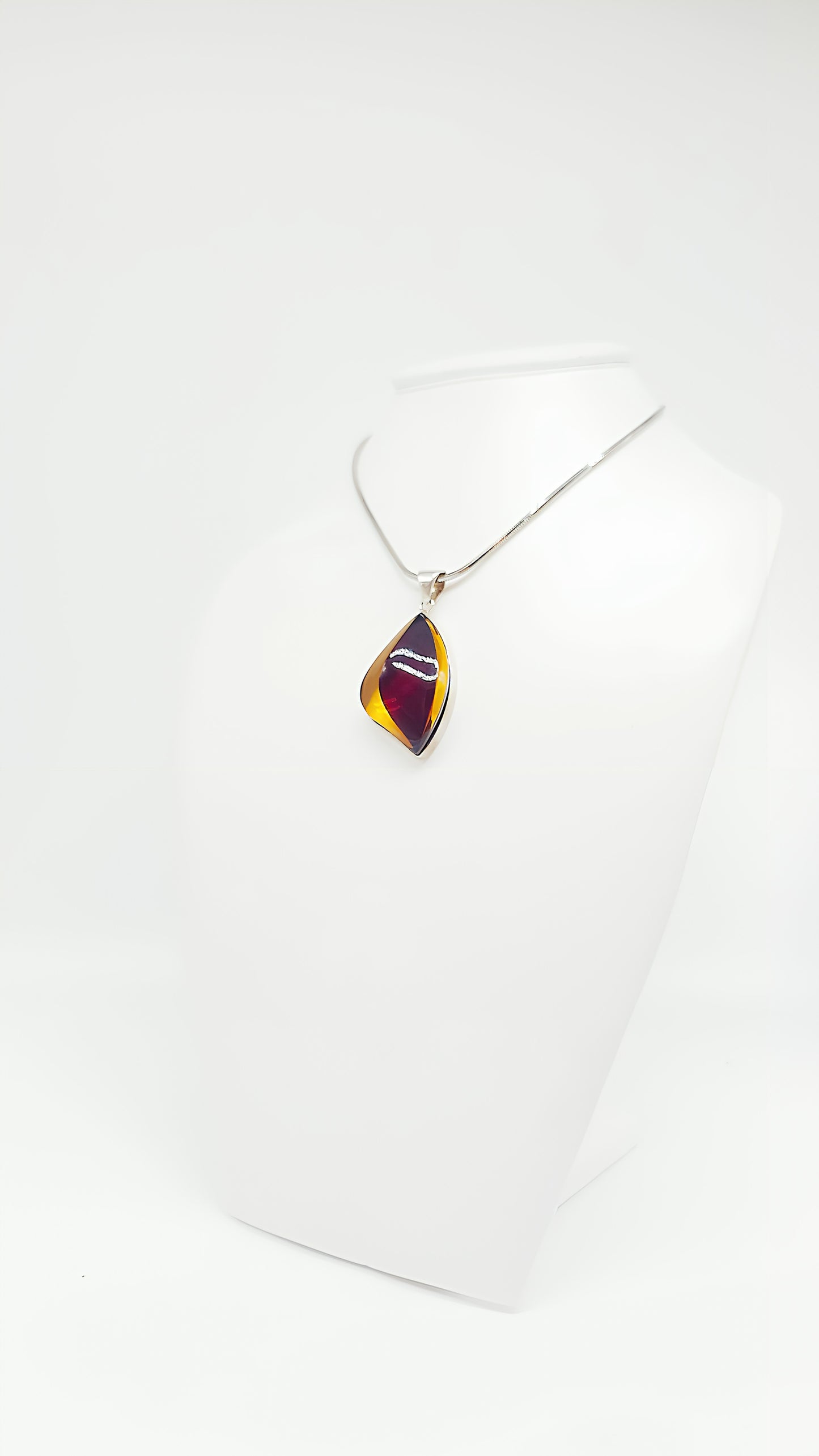 Unique shine: unique amber pendant