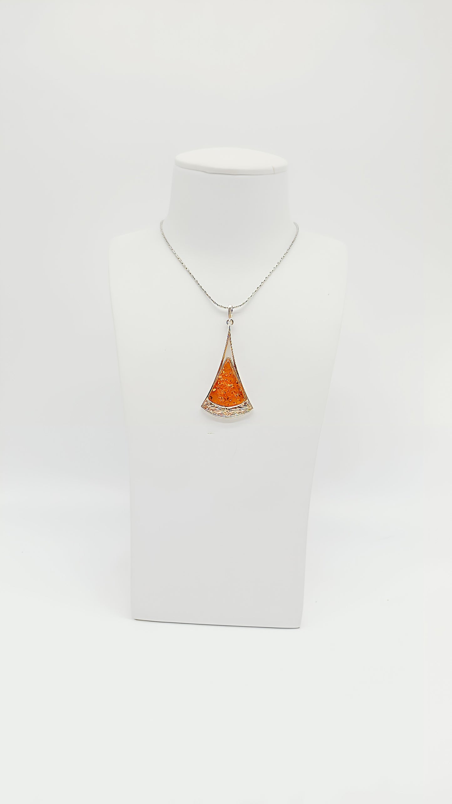 Golden accents: amber pendant in a noble design