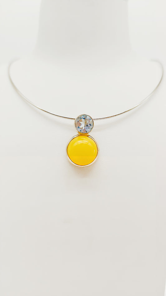 Luxueuze harmonie: barnsteen en topaas in zilver
