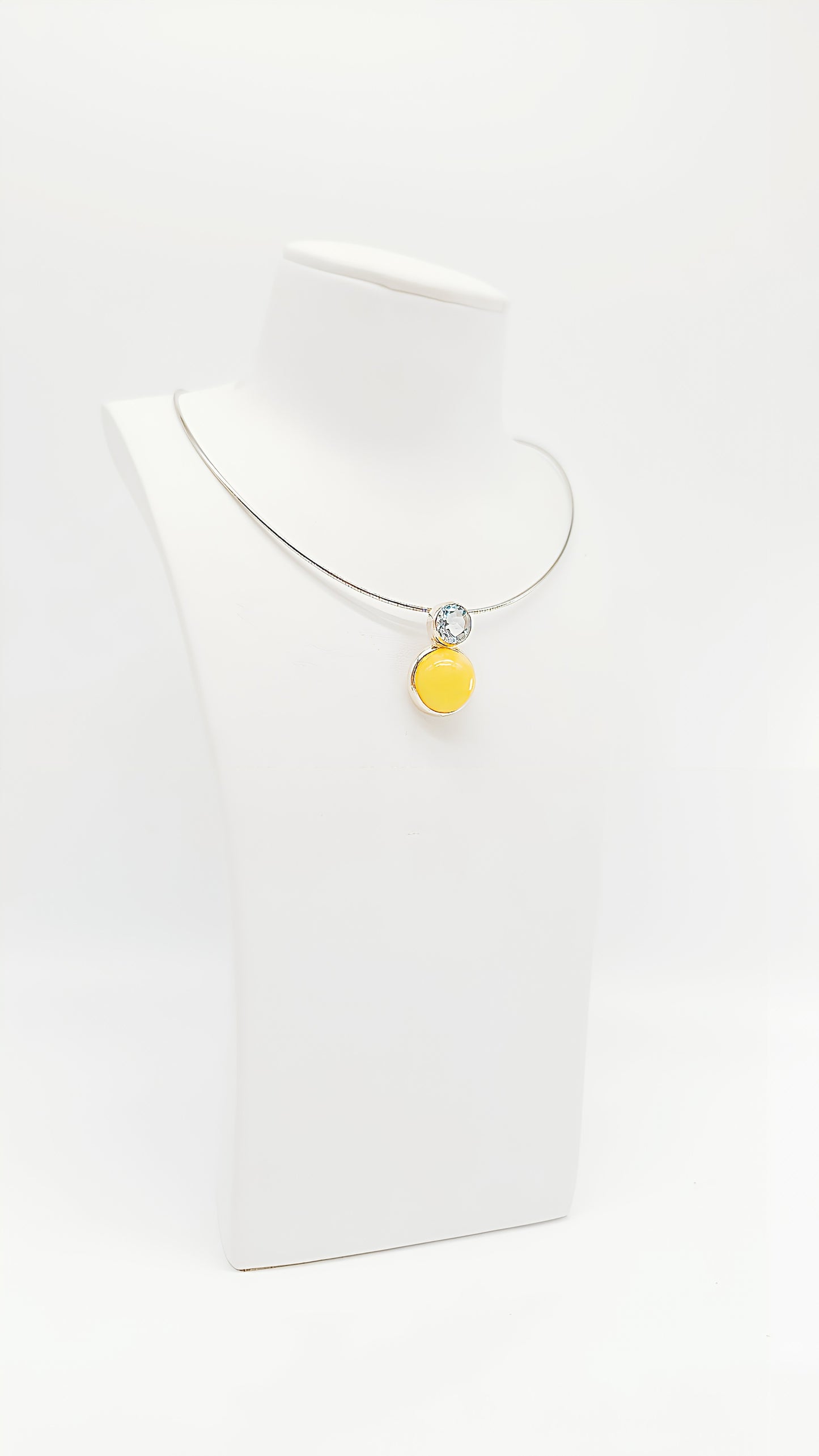 Luxurious harmony: amber and topaz in silver