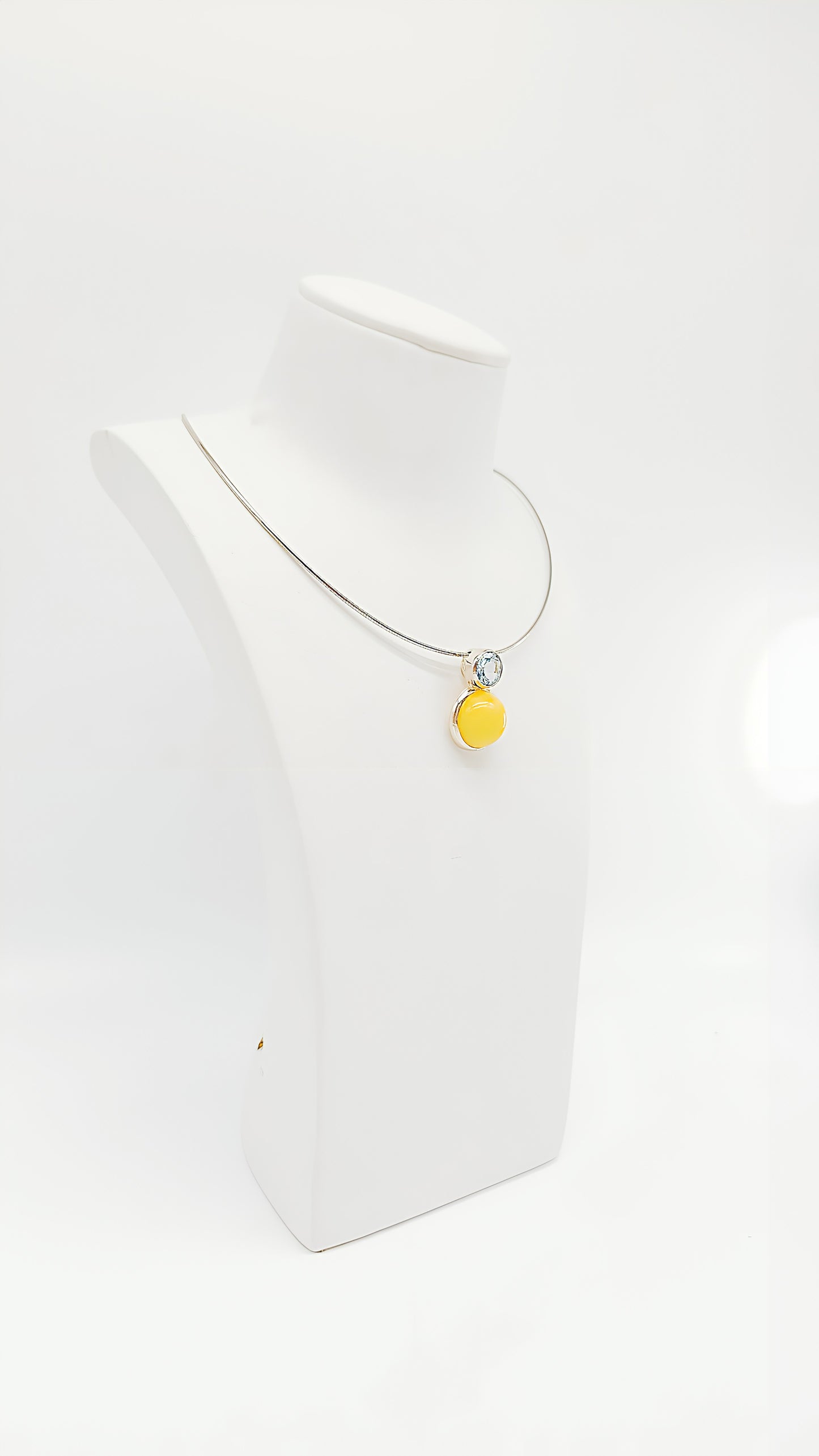 Luxurious harmony: amber and topaz in silver