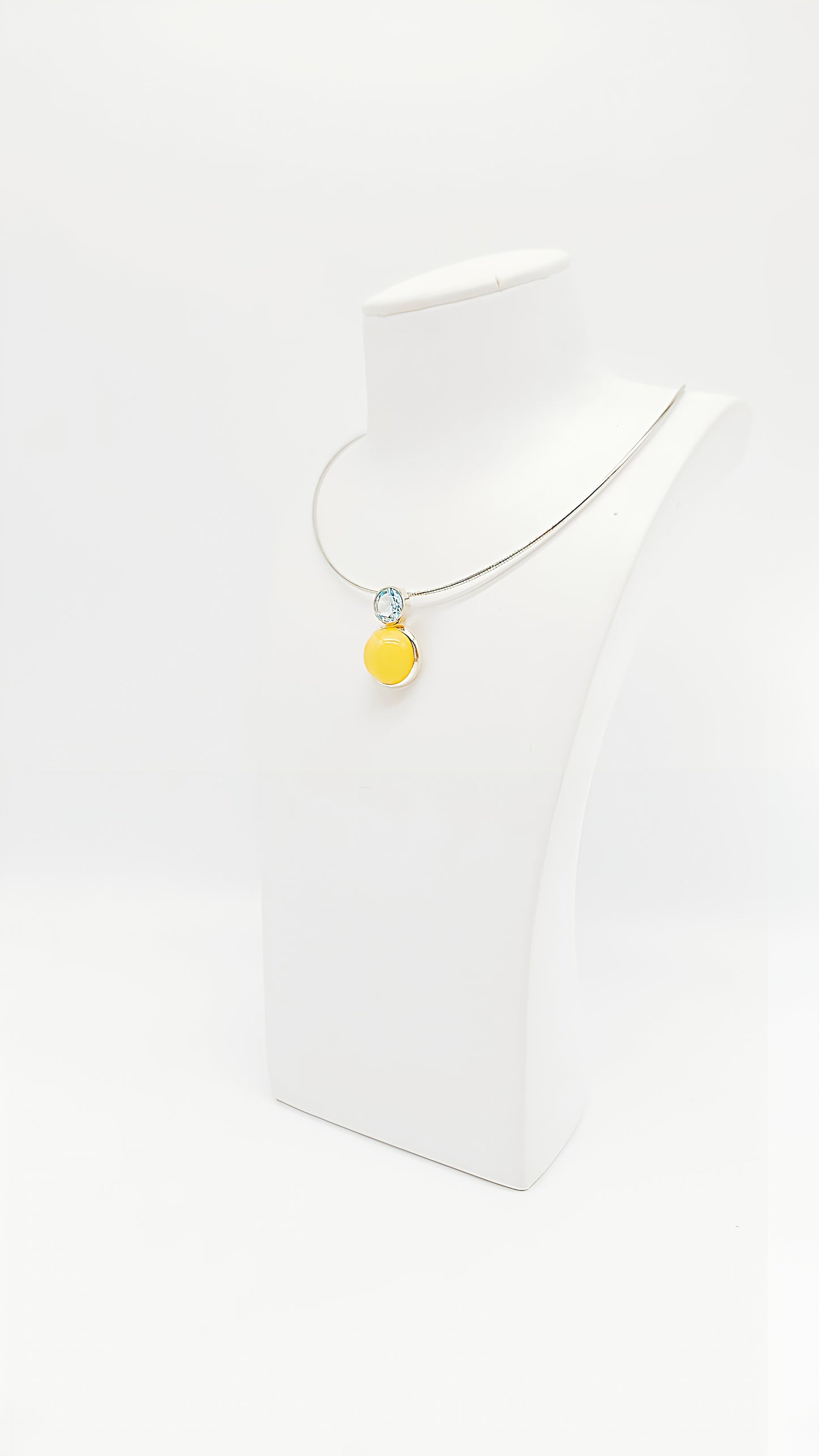 Luxurious harmony: amber and topaz in silver