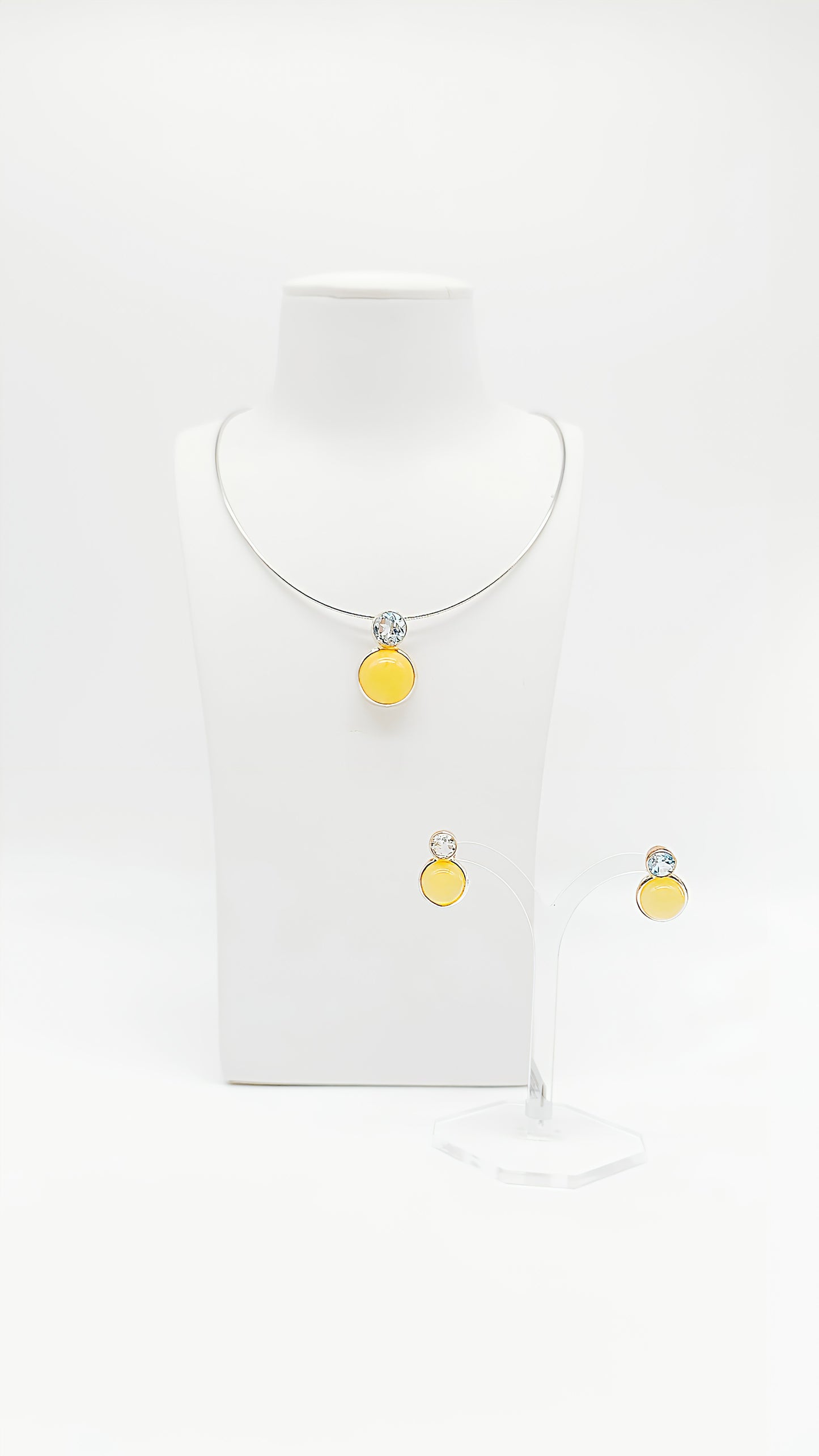 Luxurious harmony: amber and topaz in silver