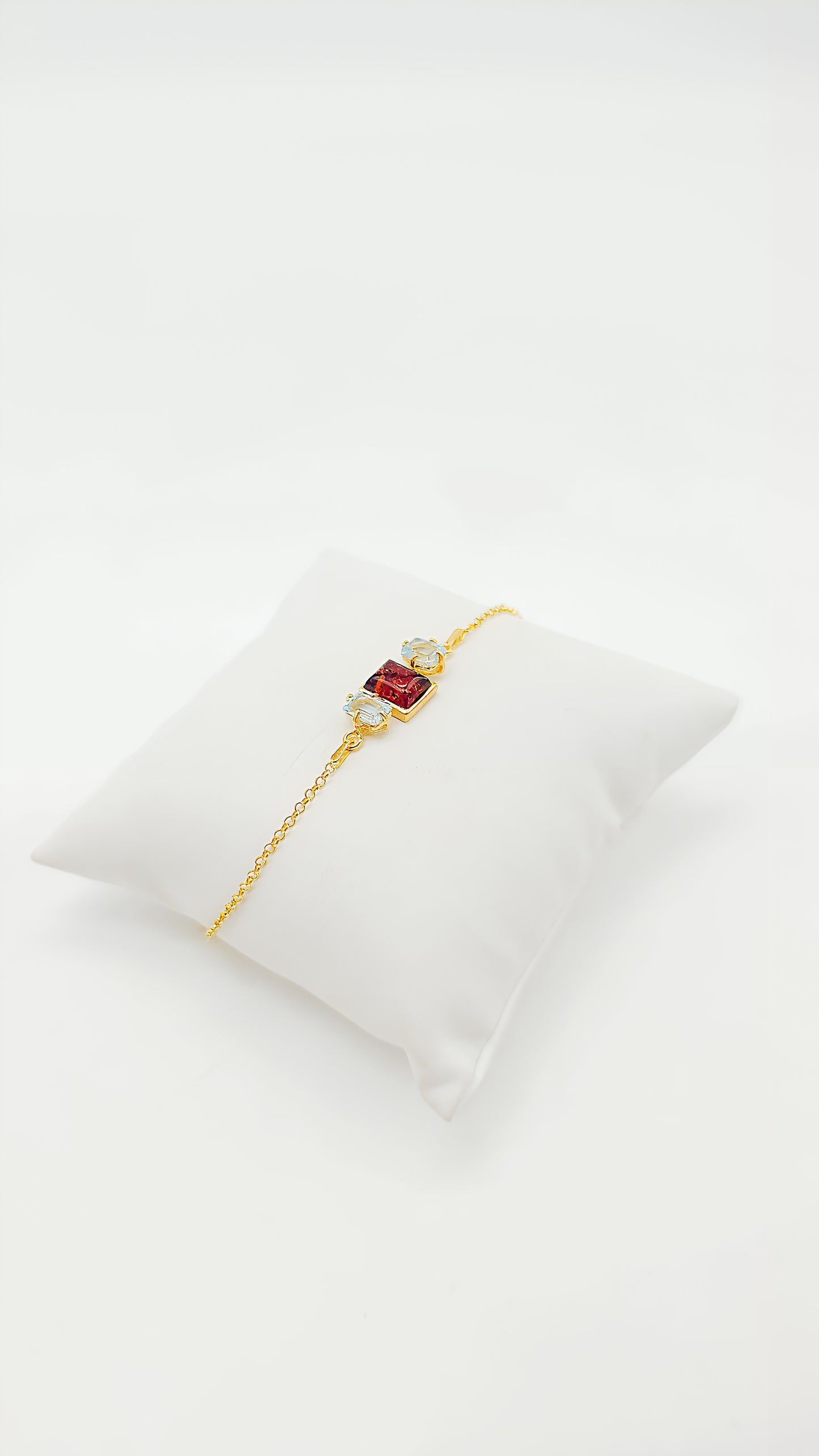 Vergoldetes Armband mit Bernstein und Topas