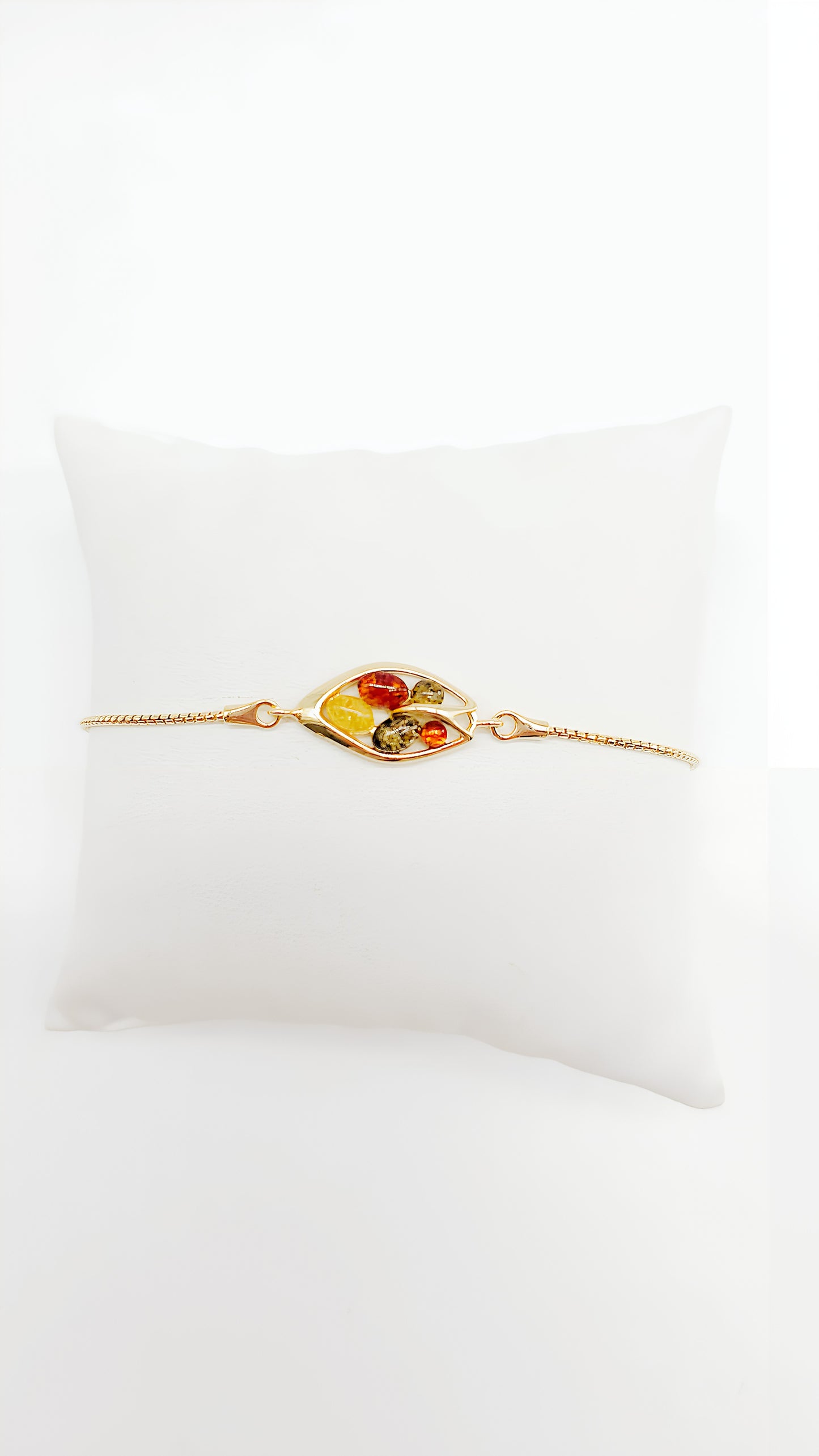 Colorful treasures: amber and gold-plated silver