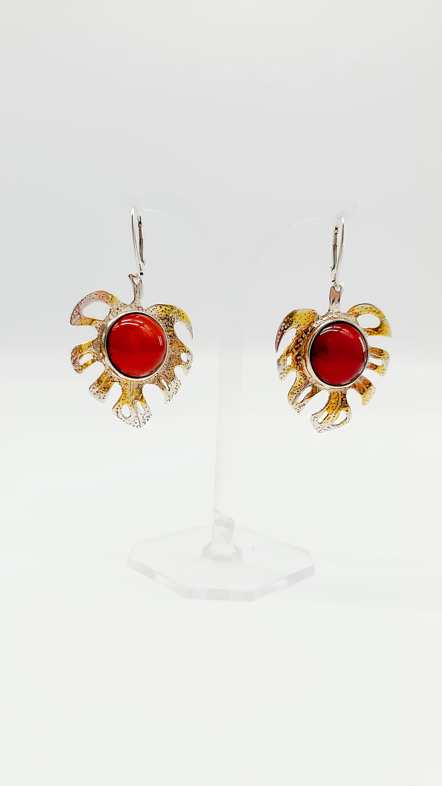 Gold-plated leaf design with bright amber