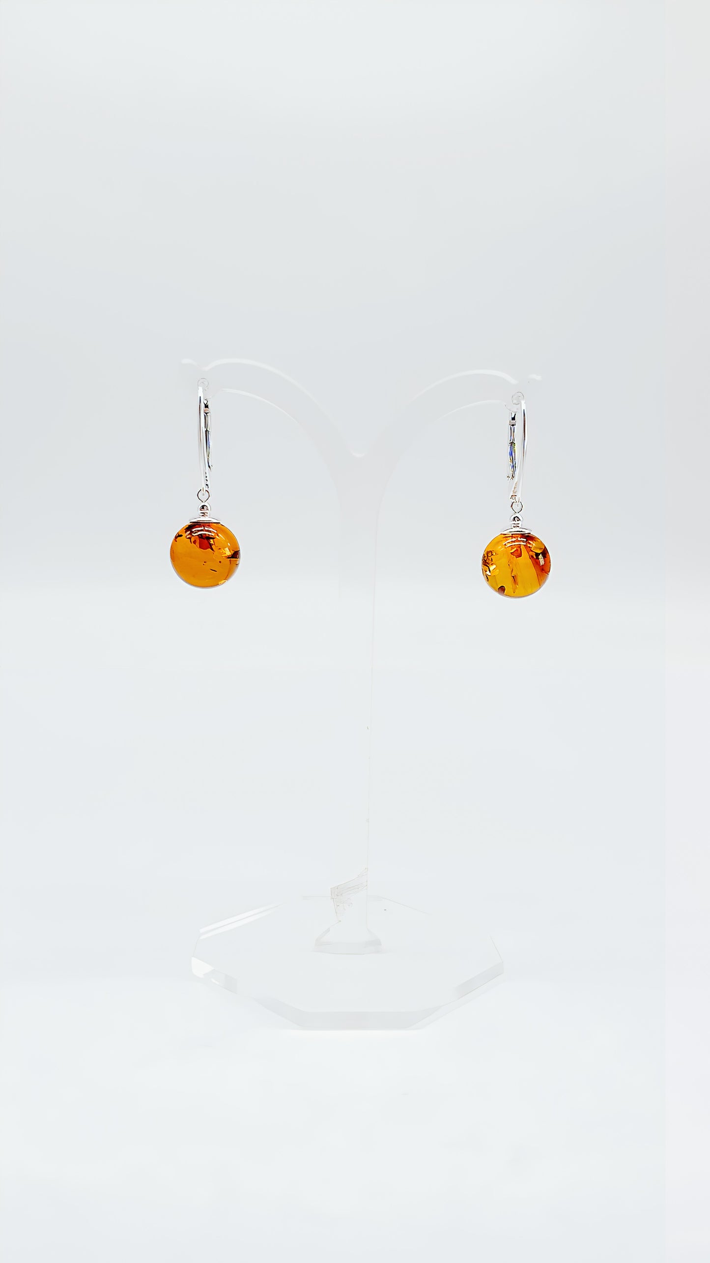 Classic earrings with amber charm