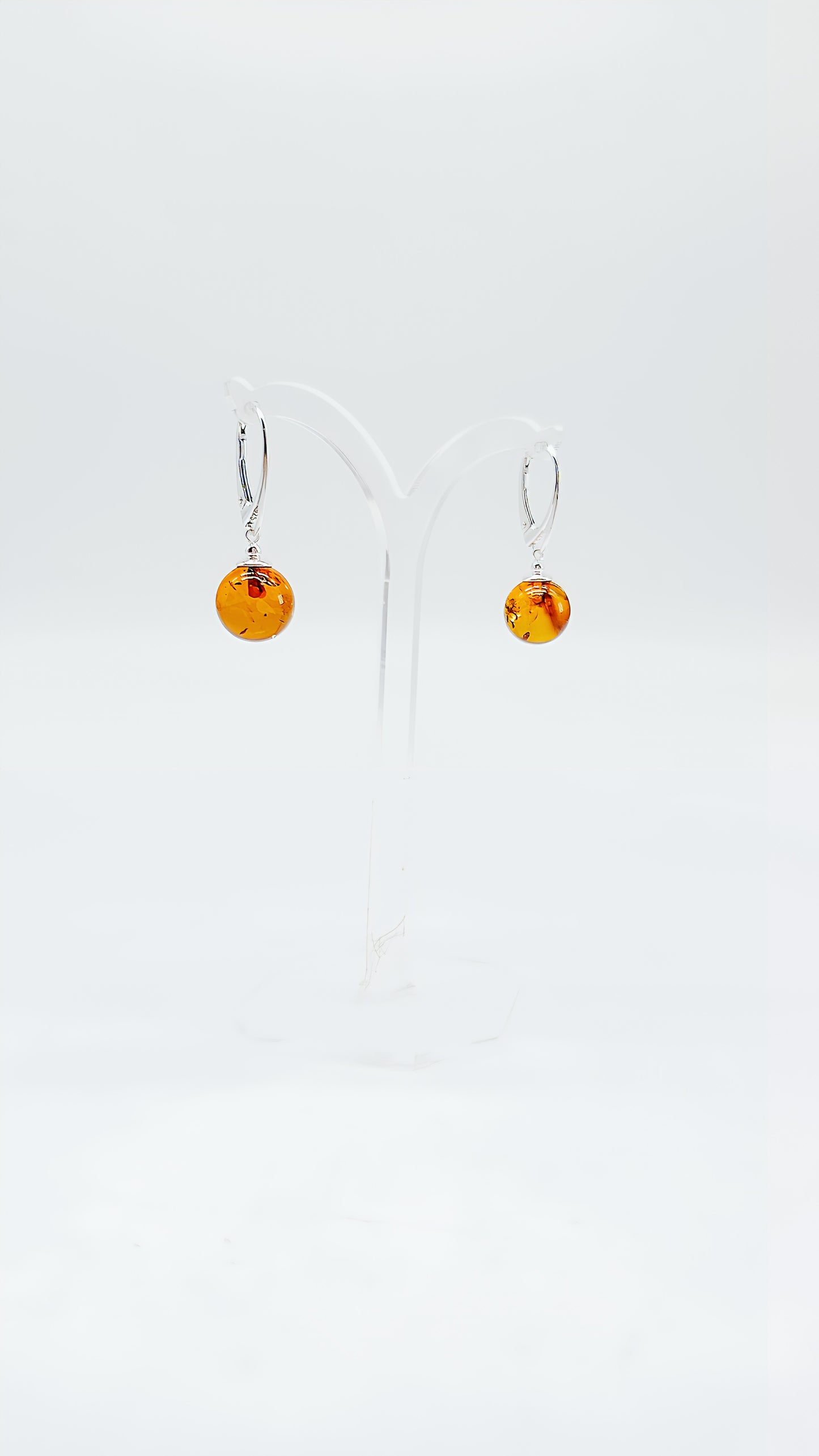 Classic earrings with amber charm