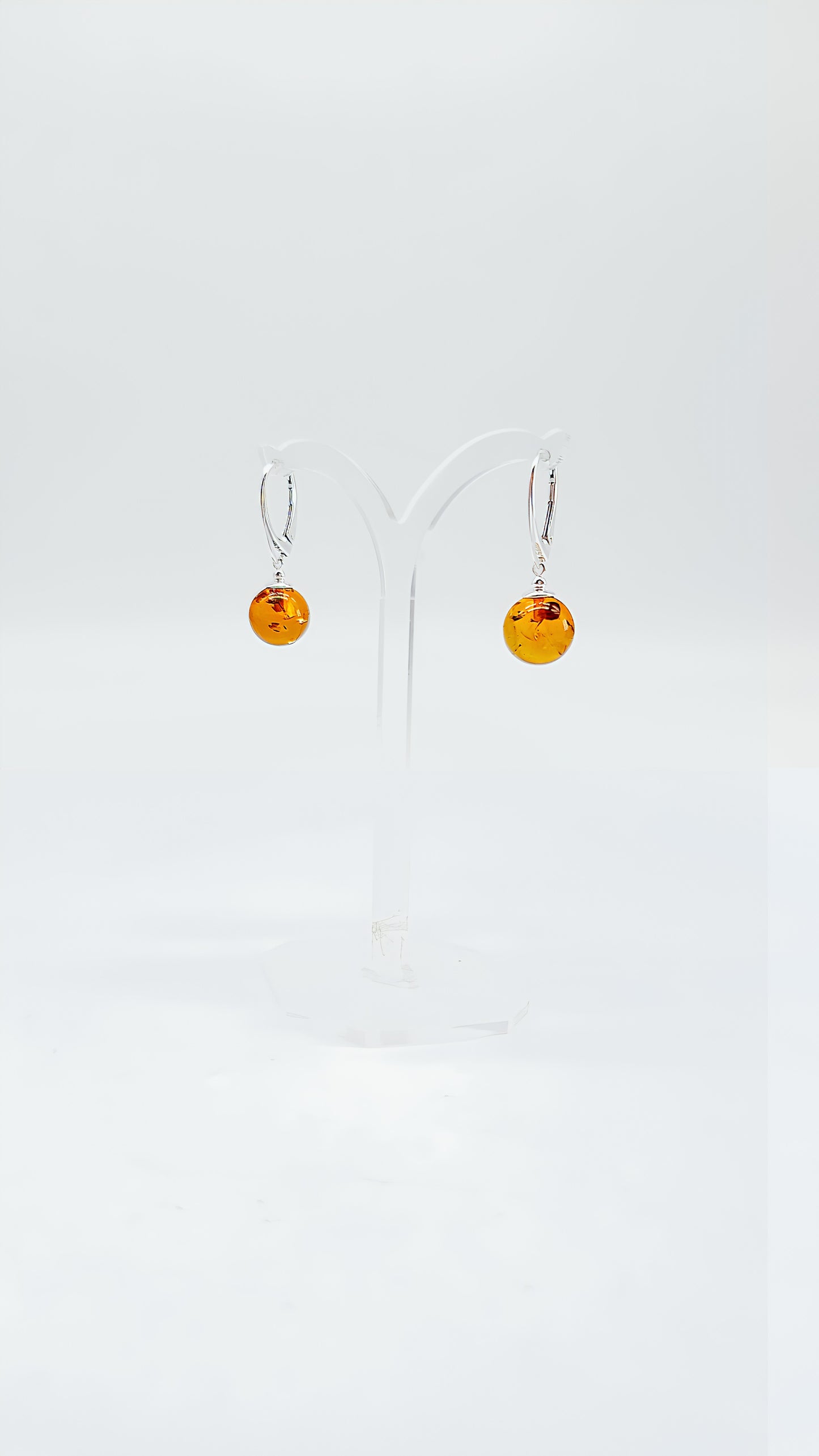 Classic earrings with amber charm