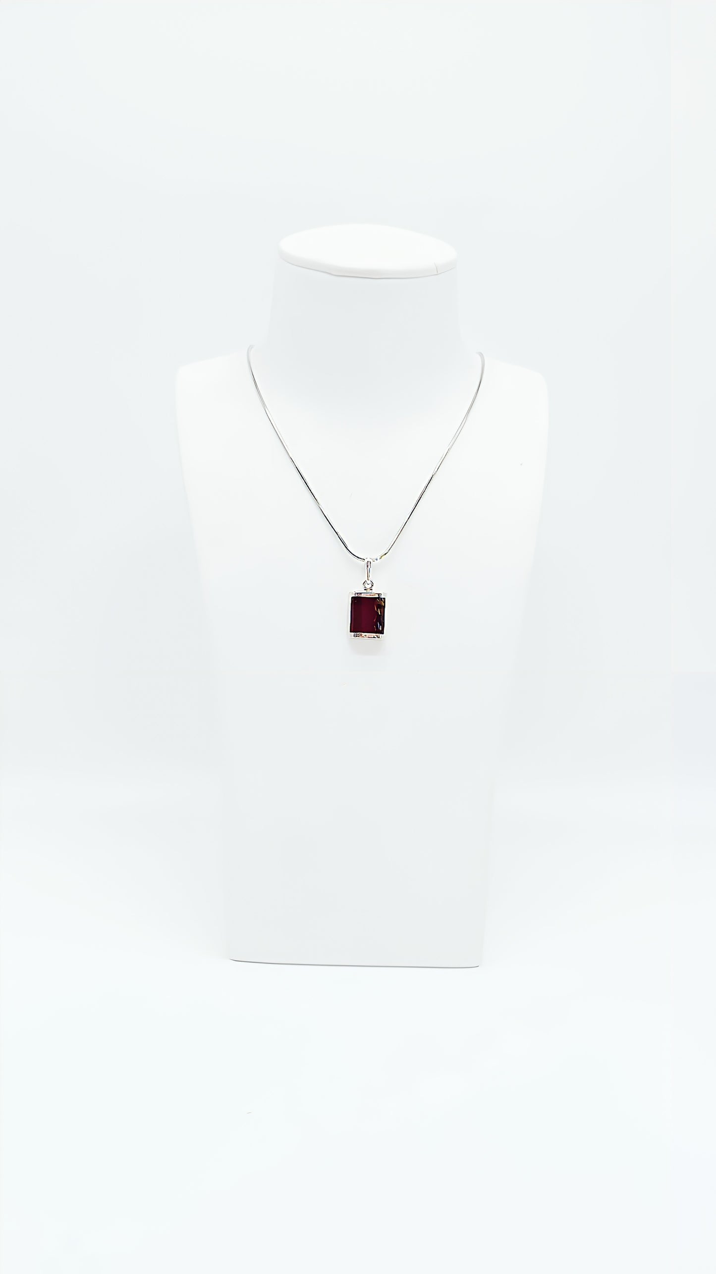 Simple and elegant: rectangular amber pendant