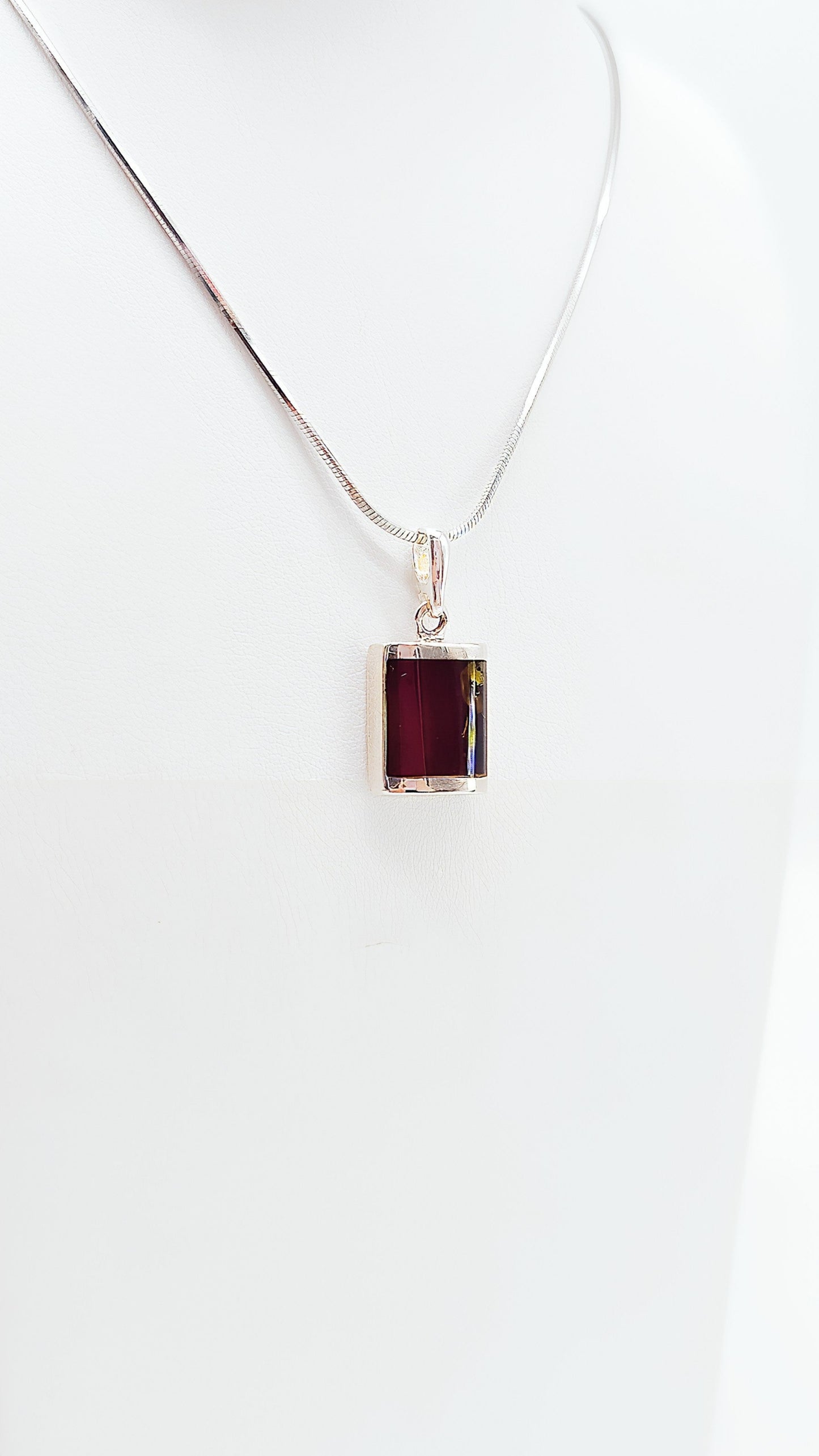 Simple and elegant: rectangular amber pendant