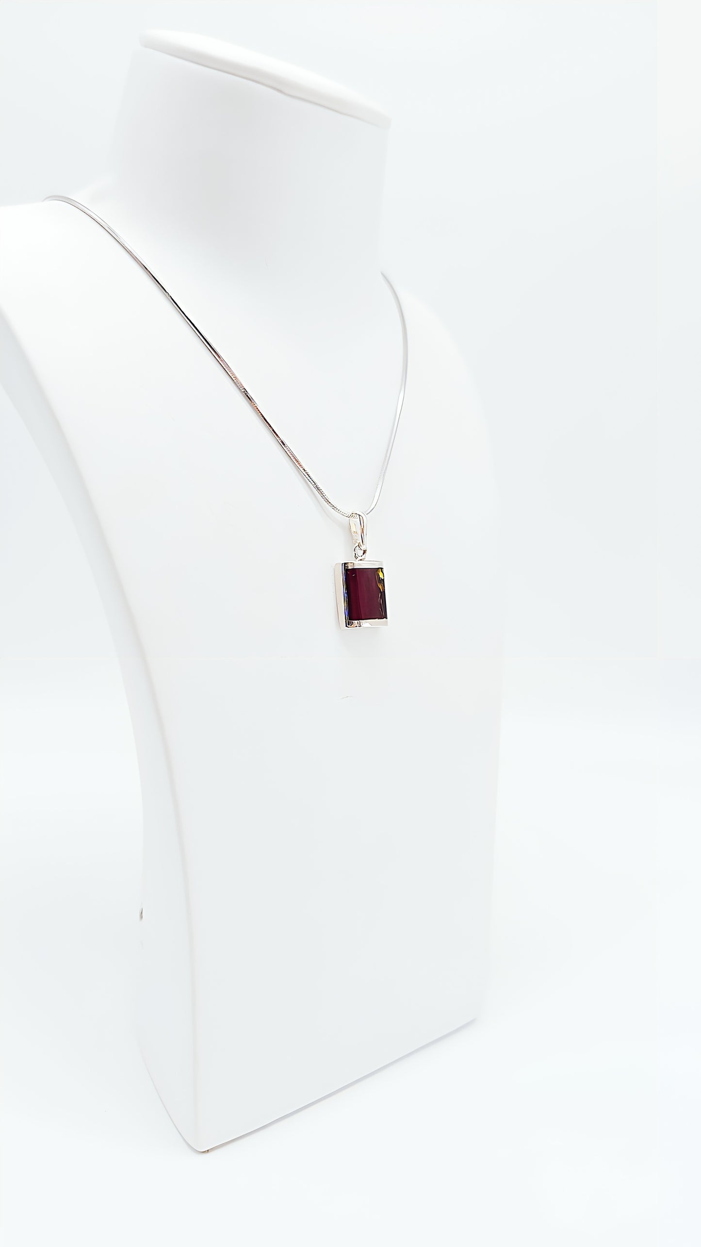 Simple and elegant: rectangular amber pendant