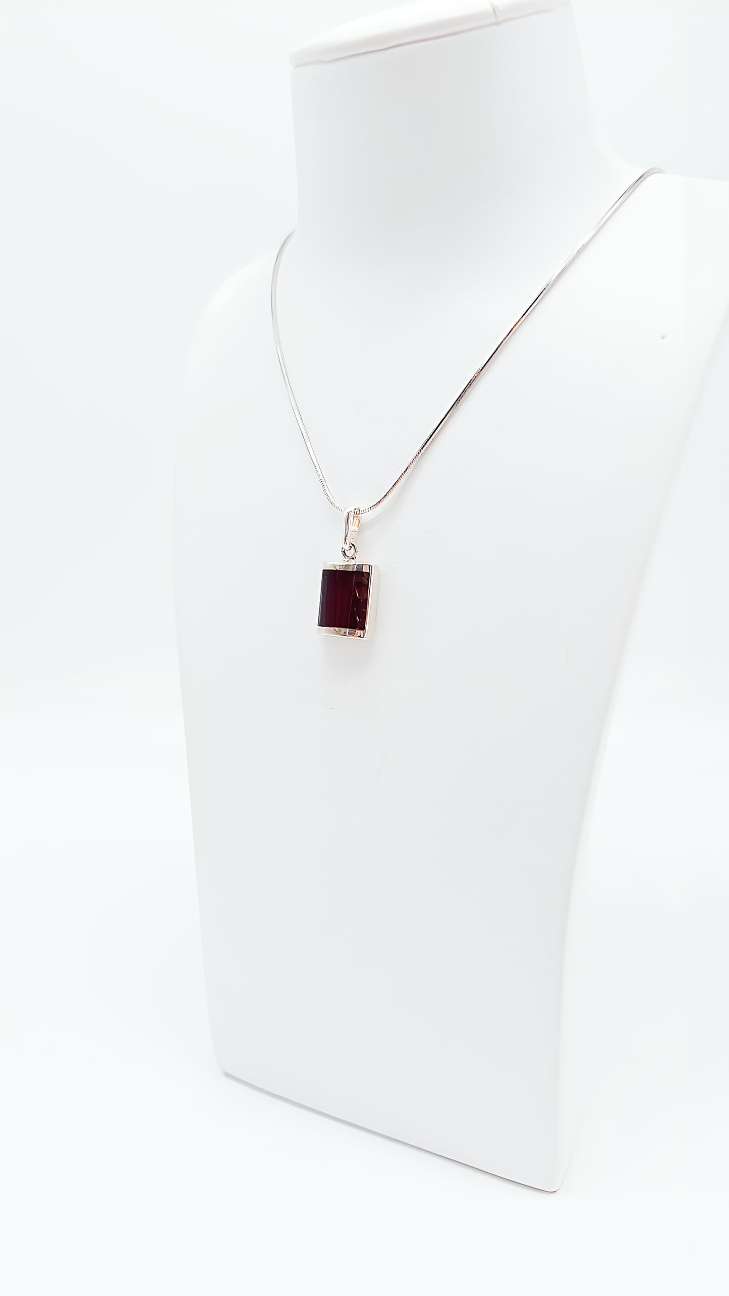 Simple and elegant: rectangular amber pendant