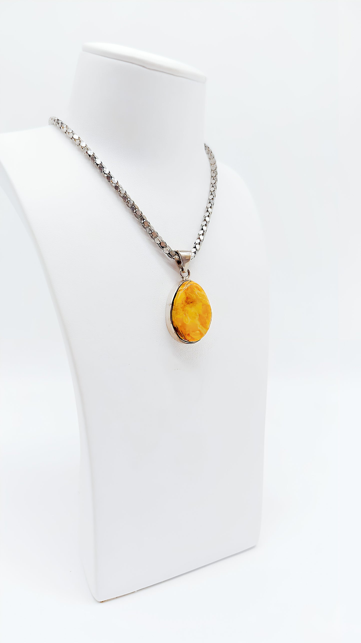 Exclusive unique jewelry – amber pendant in silver