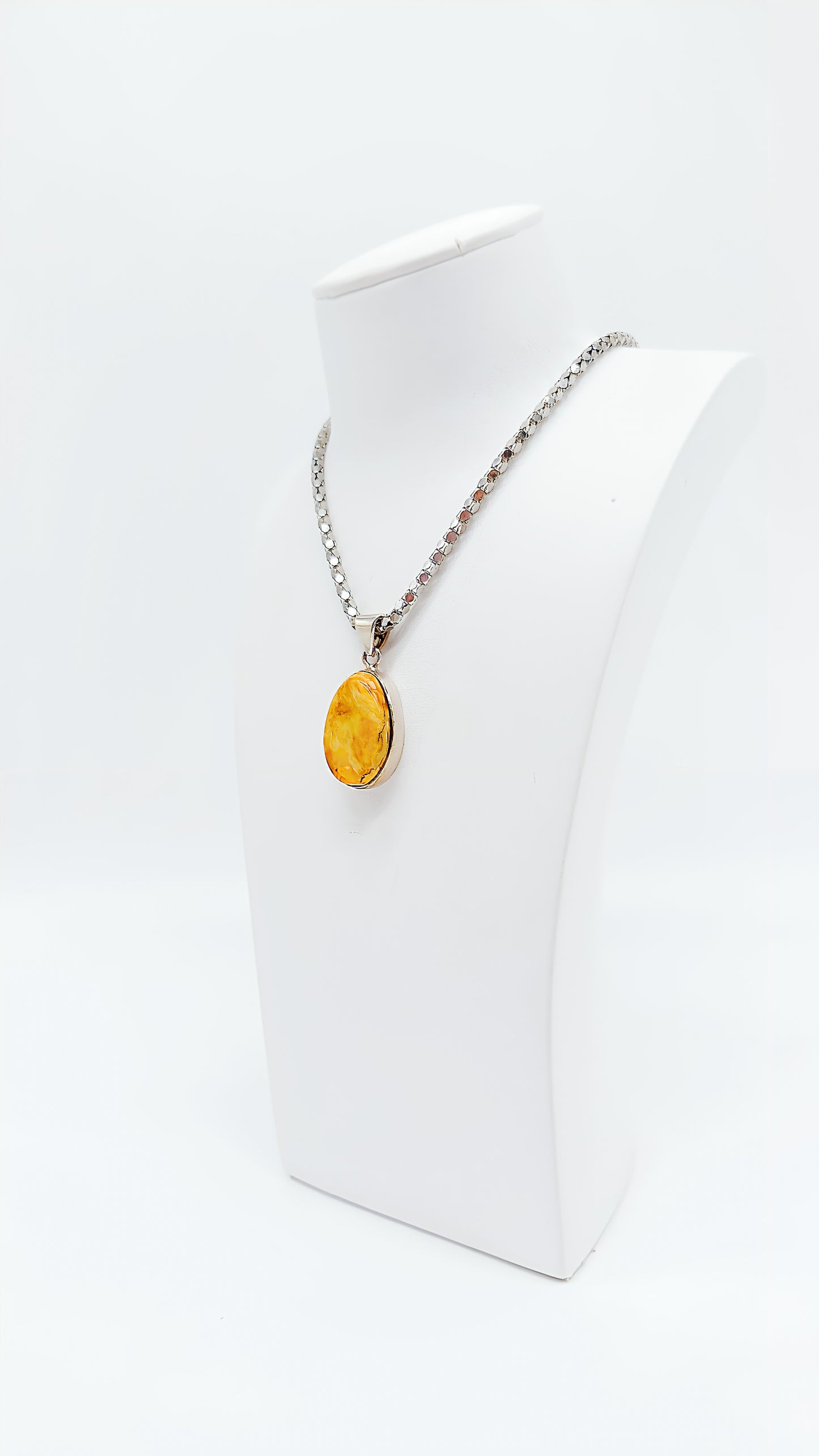 Exclusive unique jewelry – amber pendant in silver