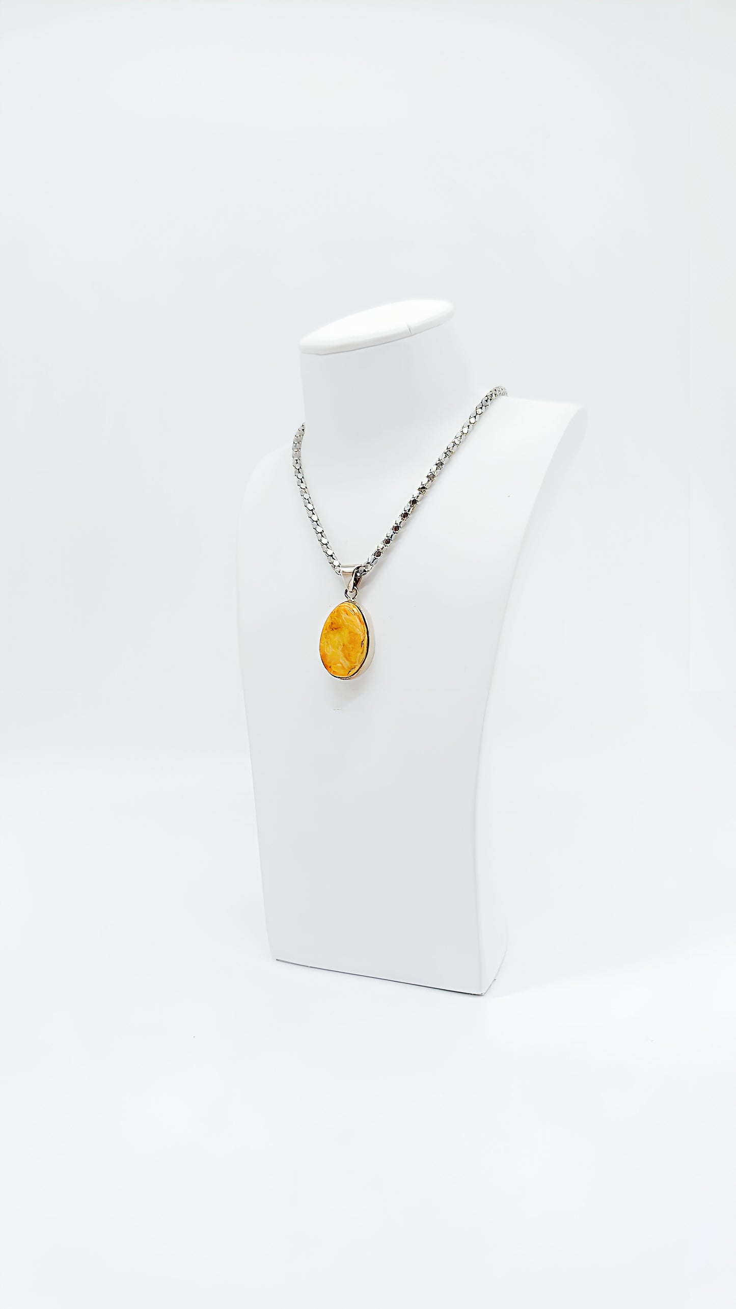 Exclusive unique jewelry – amber pendant in silver