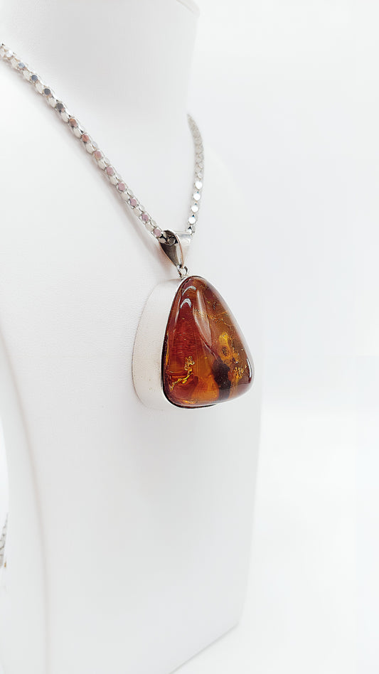 Amber pendant in drop shape – handmade unique piece