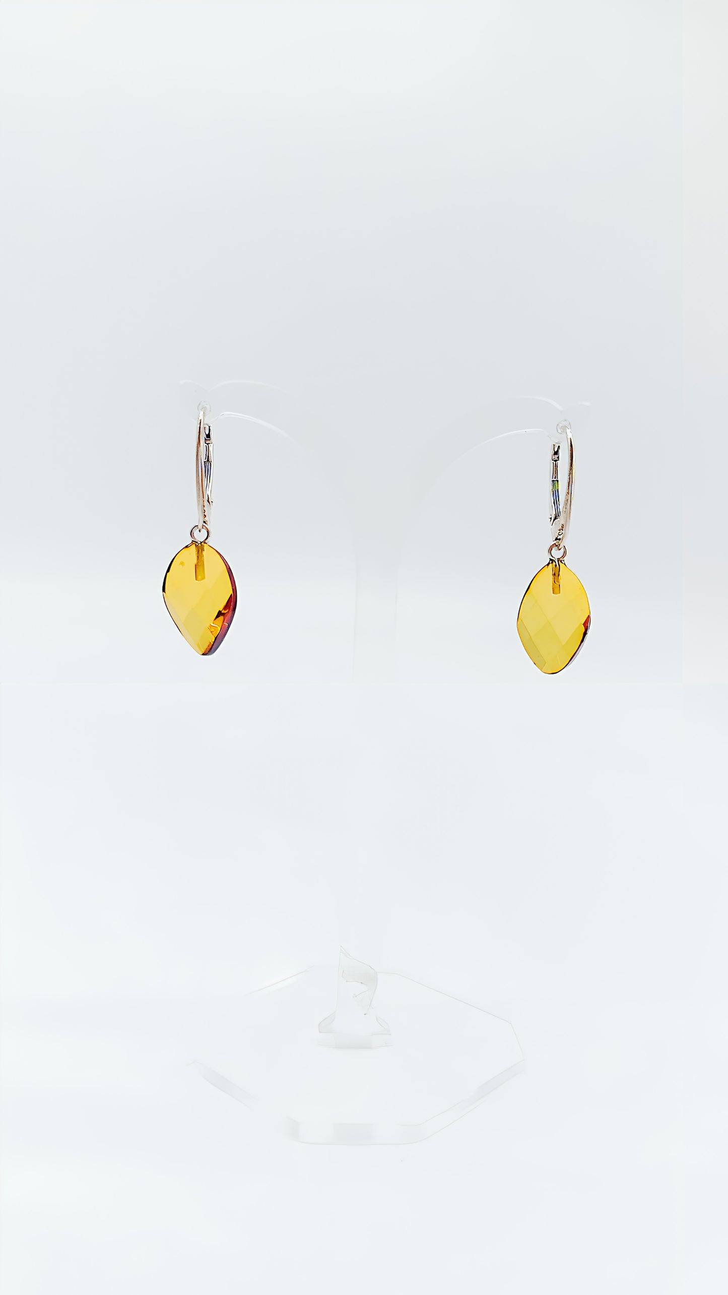 Earrings with faceted amber: radiant accents