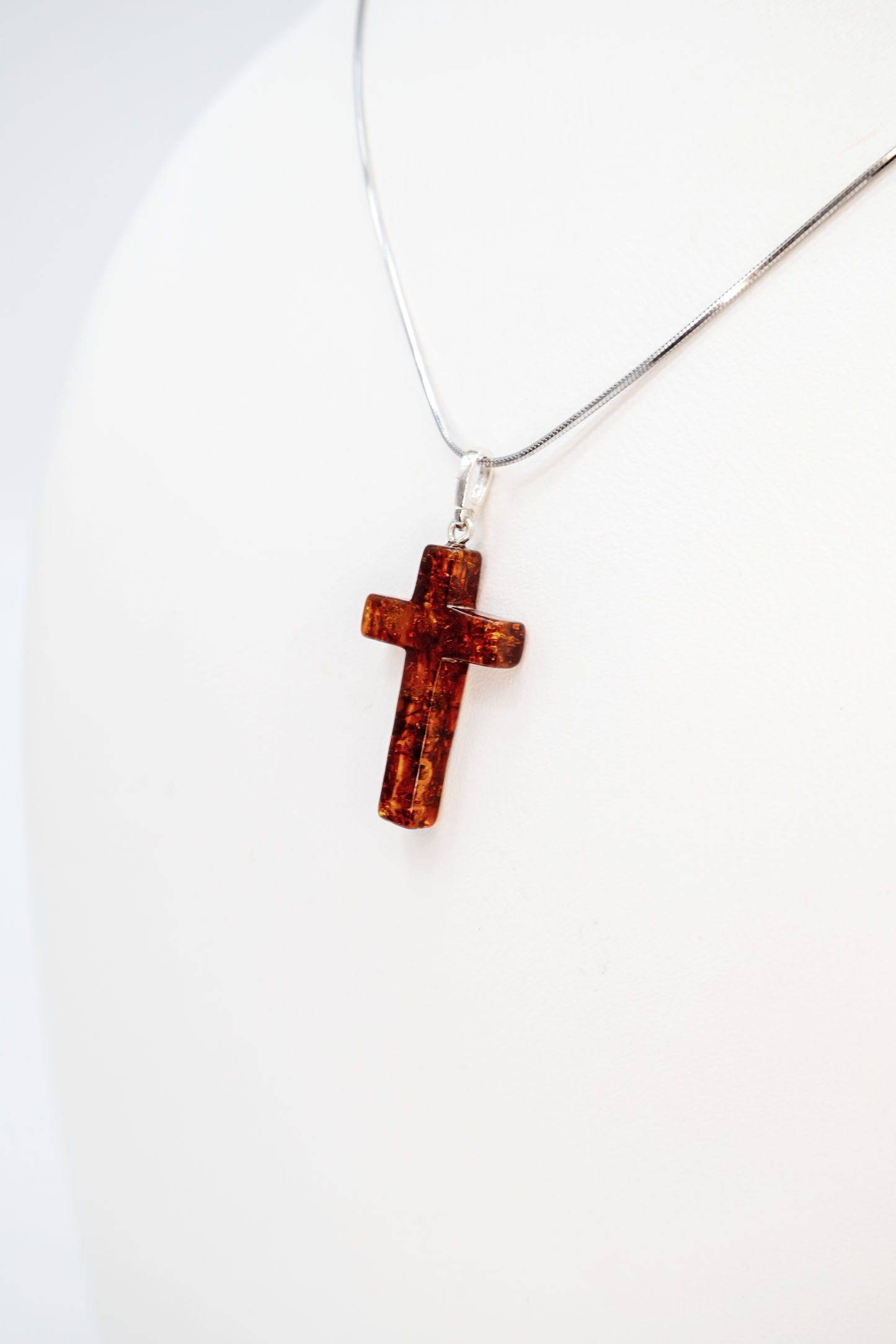 Bernstein Kreuz Silber – stilvoller Schmuck für Damen & Herren